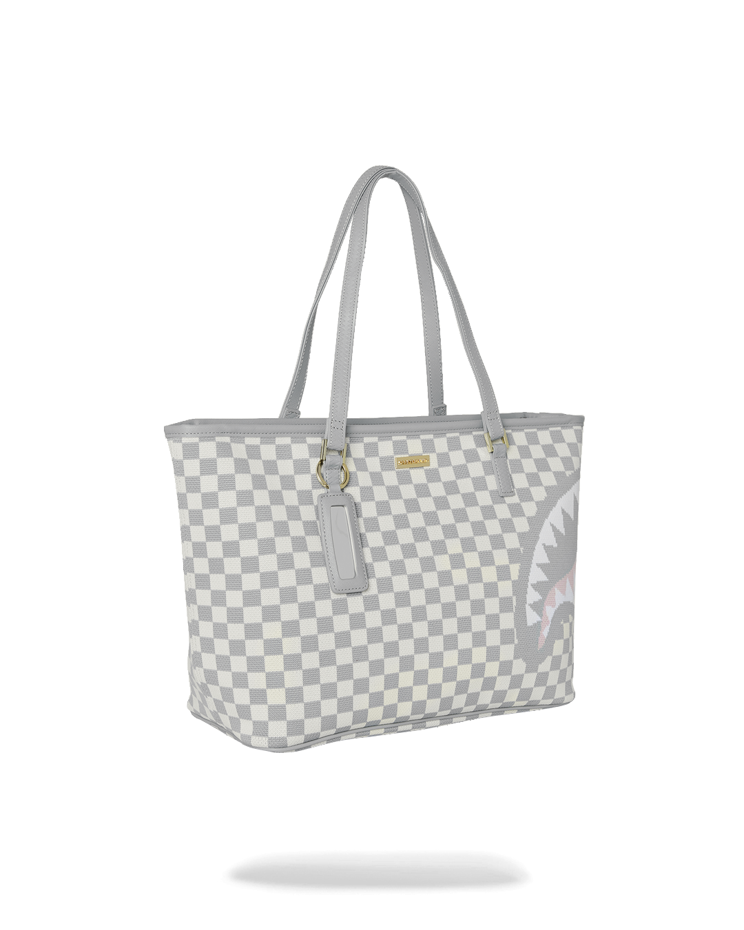 Sprayground Printed Tote Bag in use, carried over the shoulder