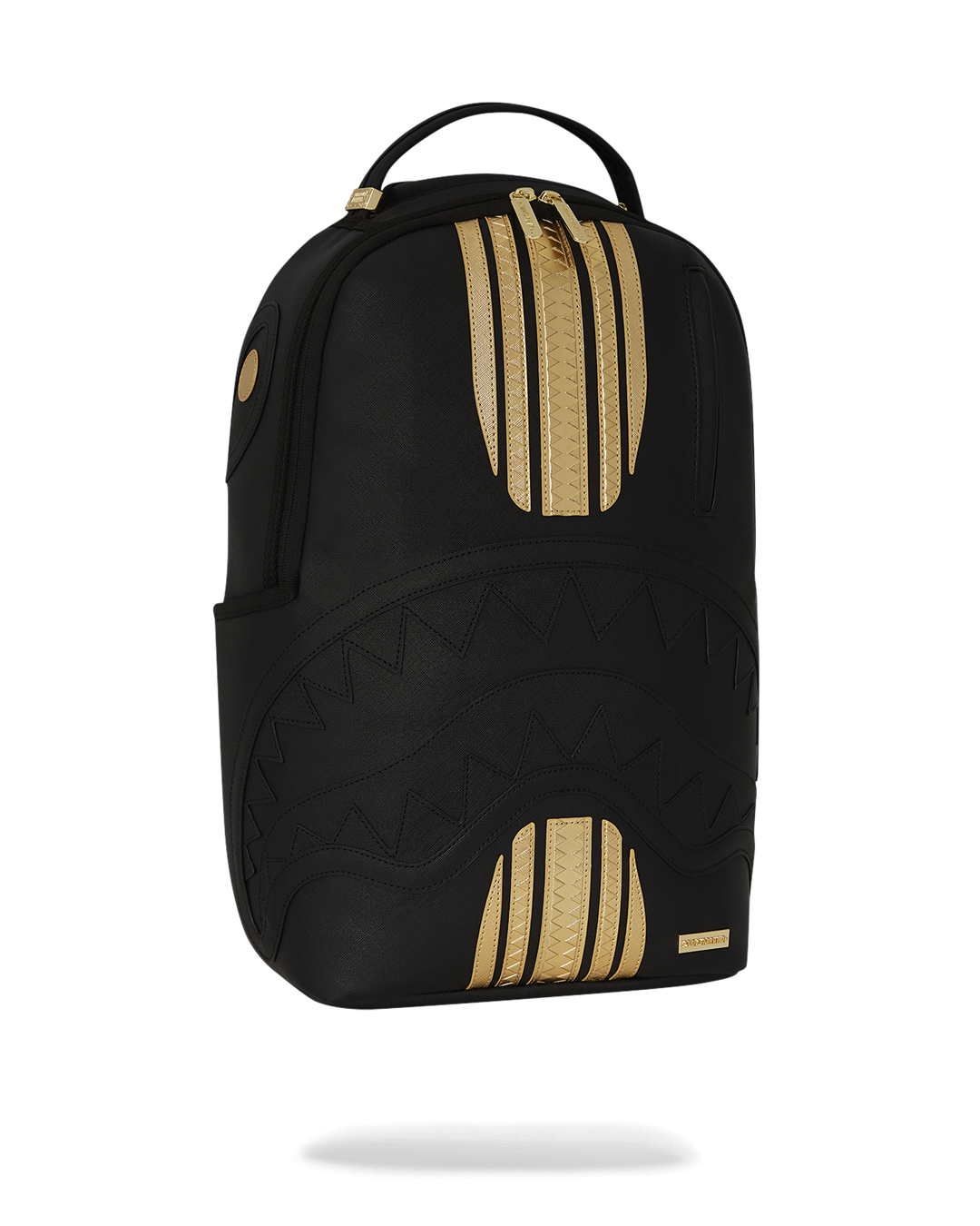 Close-up of the gold zipper and metal Sprayground Authentic badge on the backpack.