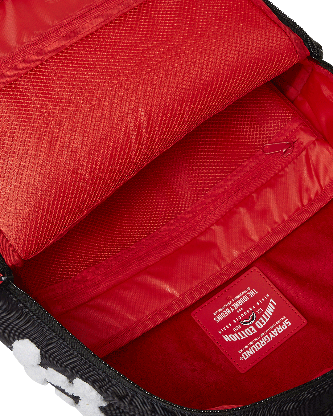 Sprayground Hey Arnold collaborative backpack side view showing ergonomic mesh back padding