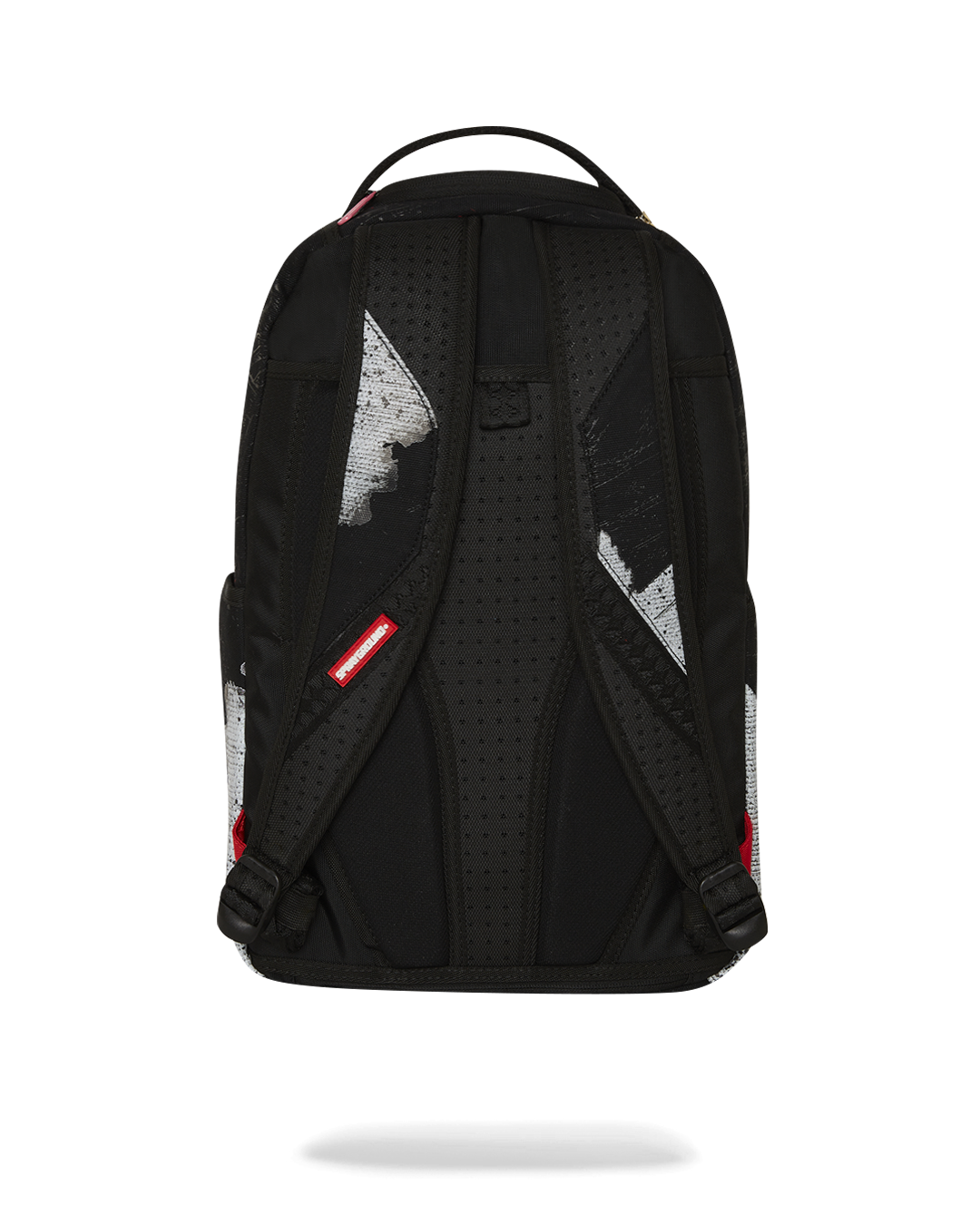 Front view of the Shark Central waxed cotton canvas backpack showing side pockets and front zipper.