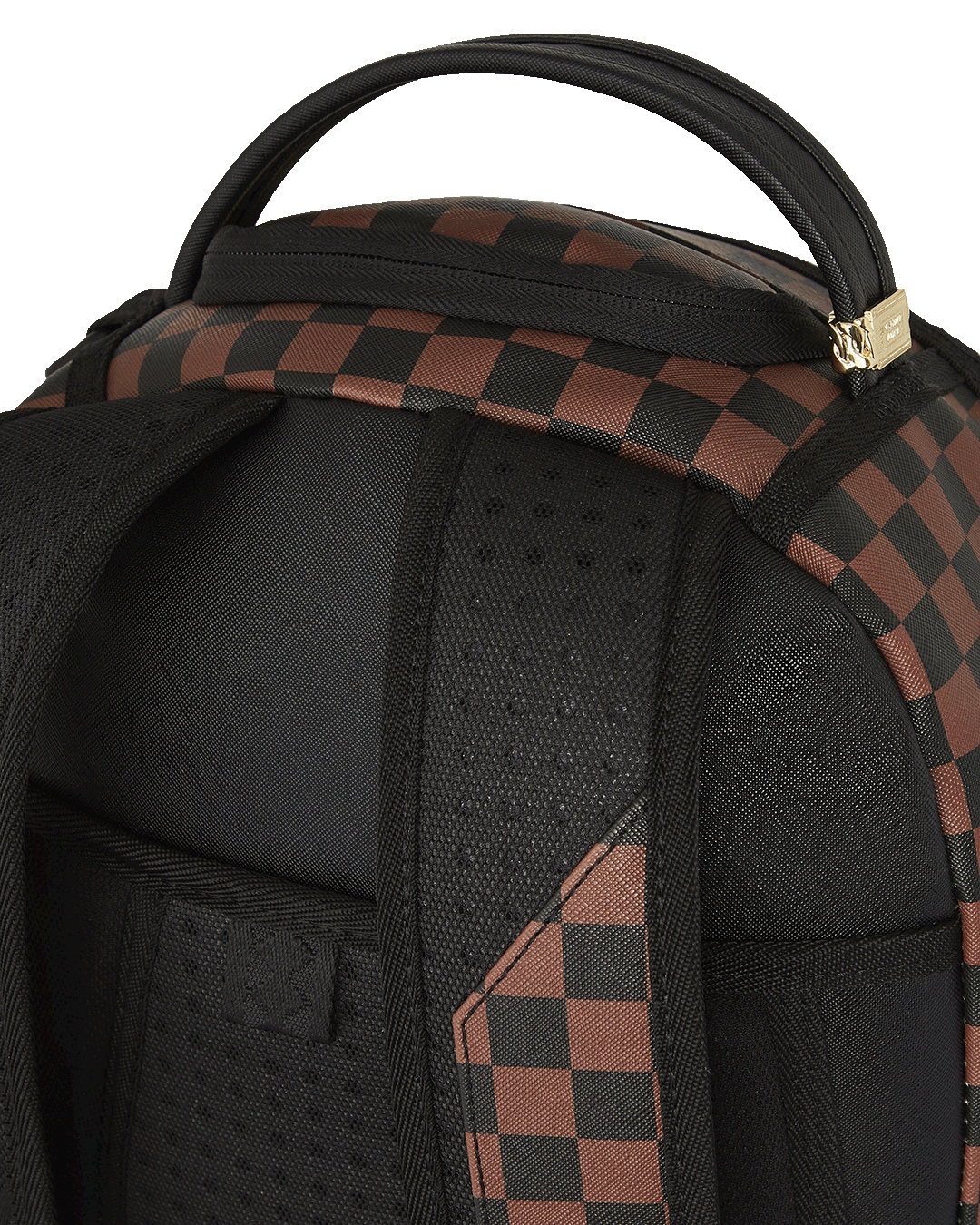 Close-up of the faux leather backpacks front zipper pocket with gold hardware