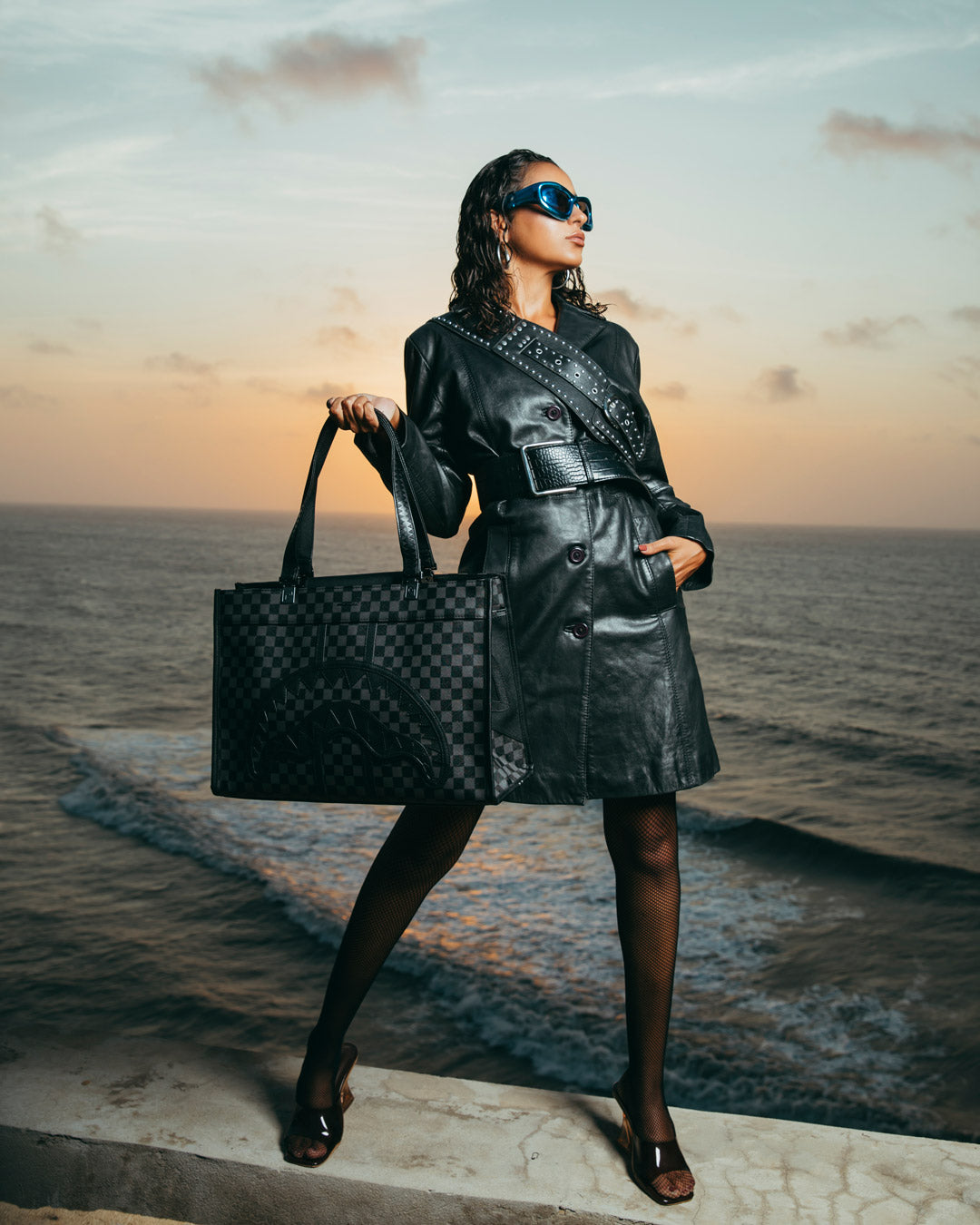 Midnight Chateau water-resistant tote shown from the front with adjustable strap.