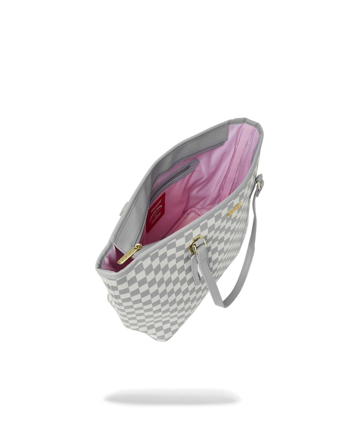Sprayground Printed Tote Bag in use, carried over the shoulder