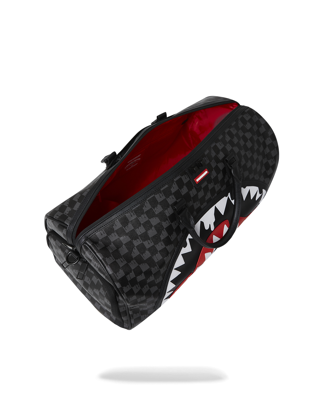 Travel-ready leather duffle with adjustable straps and sneaker pocket for gym use