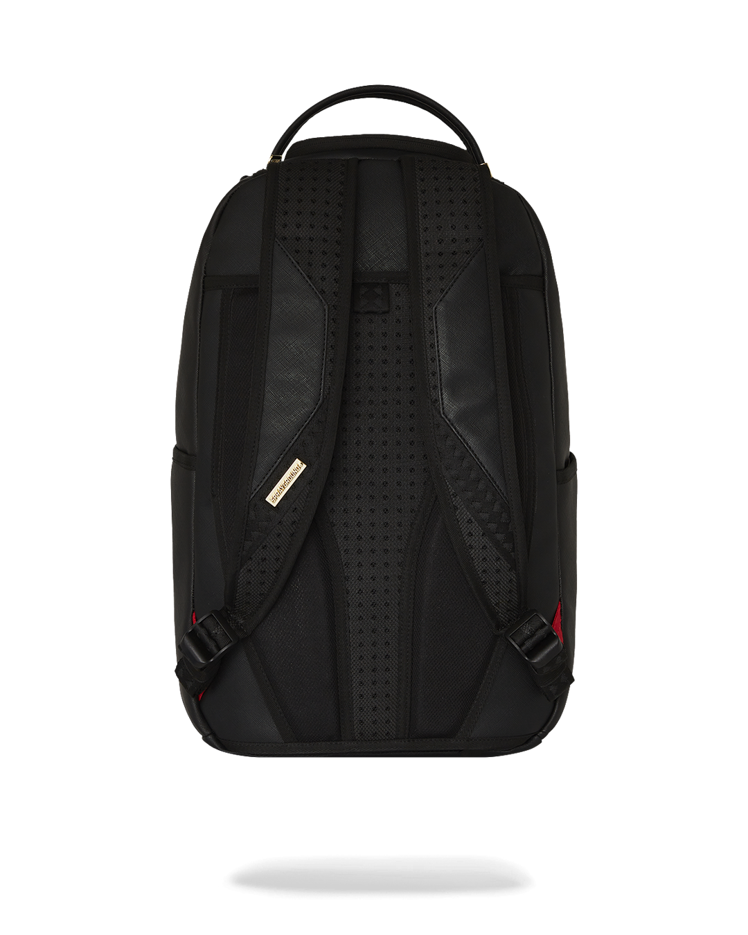 Close-up of Sprayground shark backpack’s Paris-inspired shark graphic.