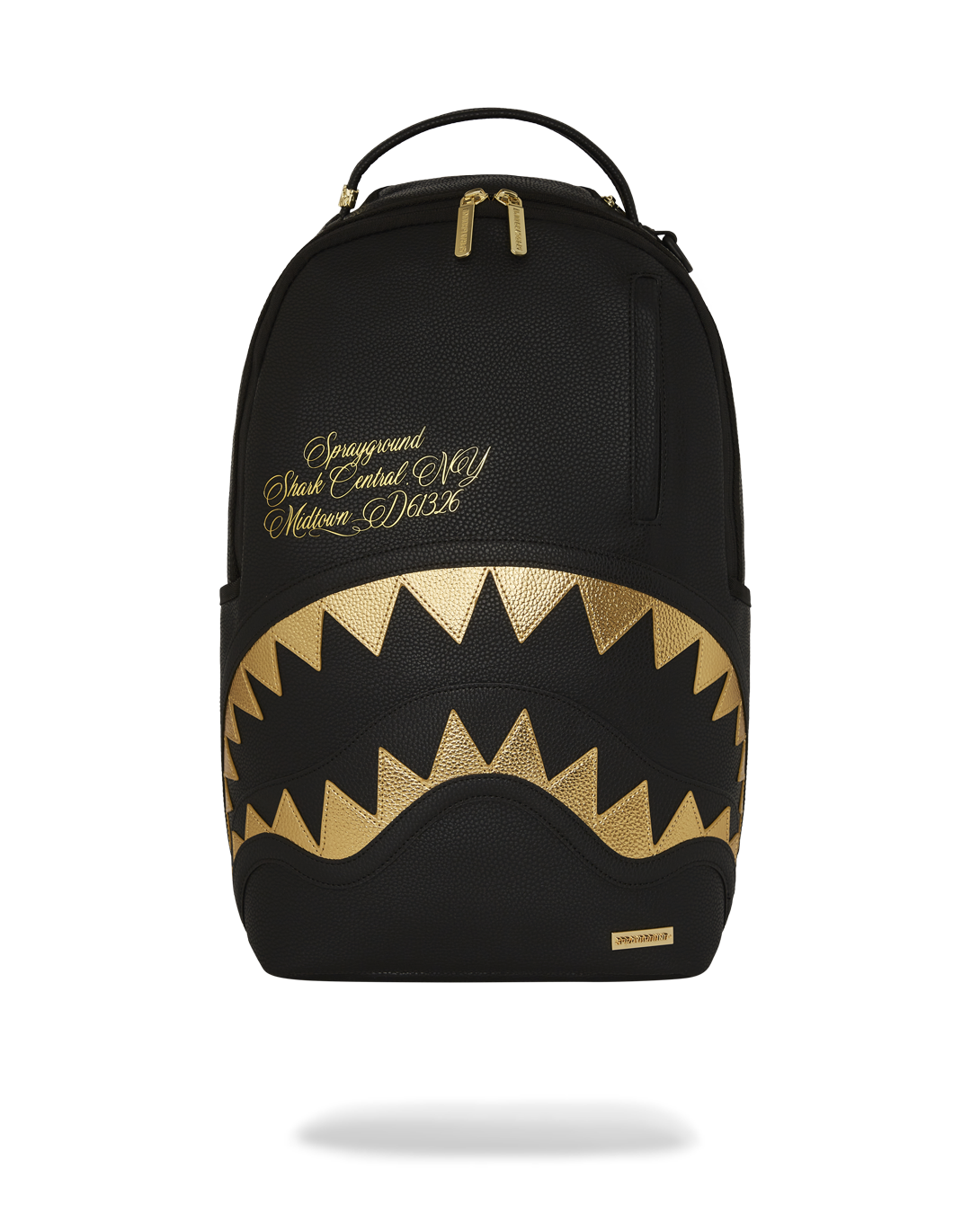 BAPE Shark backpack with faux leather finish and gold accents, front view