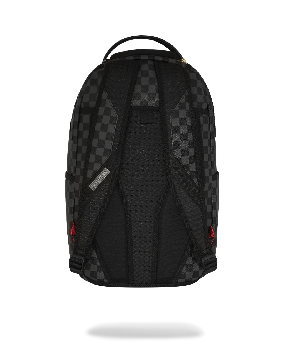 Midnight Chateau backpack worn over shoulders with urban skyline backdrop