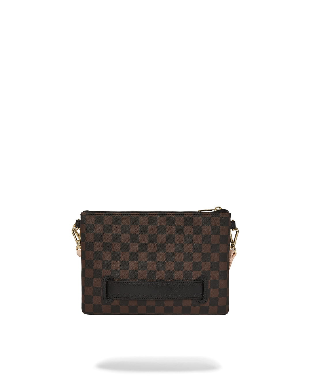 Lifestyle shot of purse wristlet being held during a city night outing