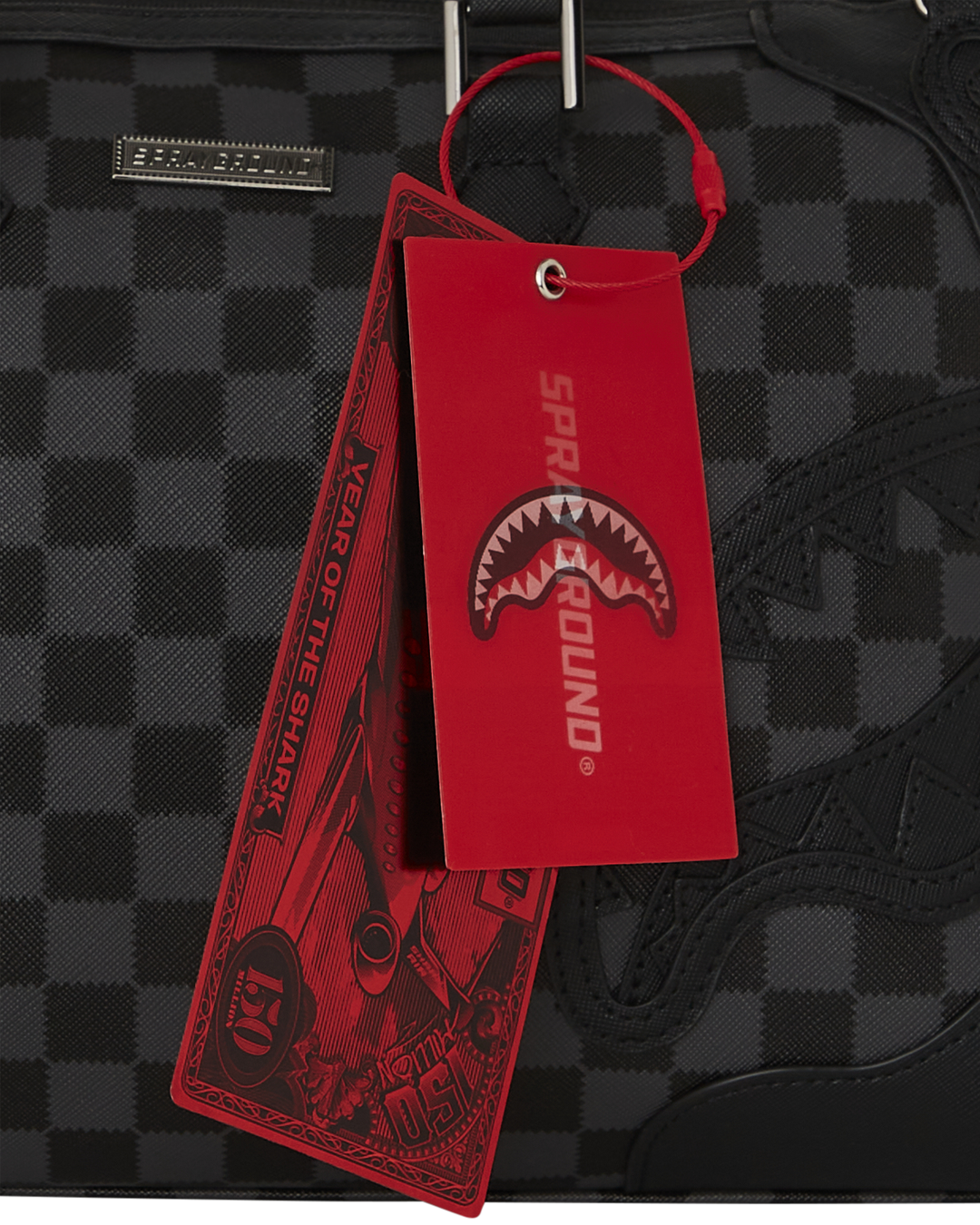Close-up of sharkmouth detailing on mini duffle bag purse