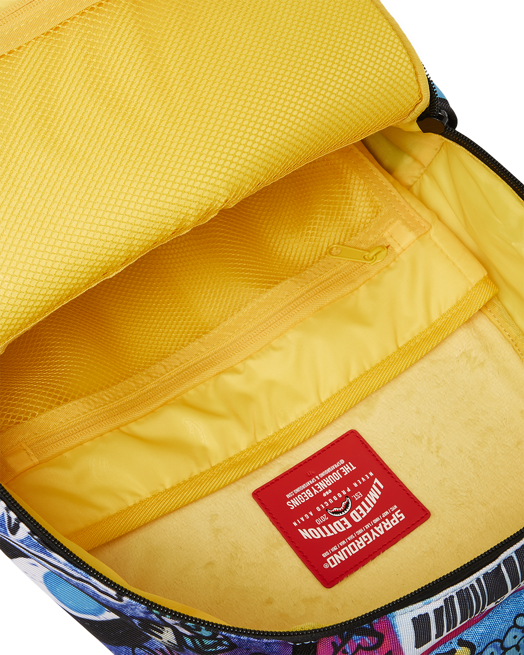 Side view showing side pockets and ergonomic mesh back padding for comfort