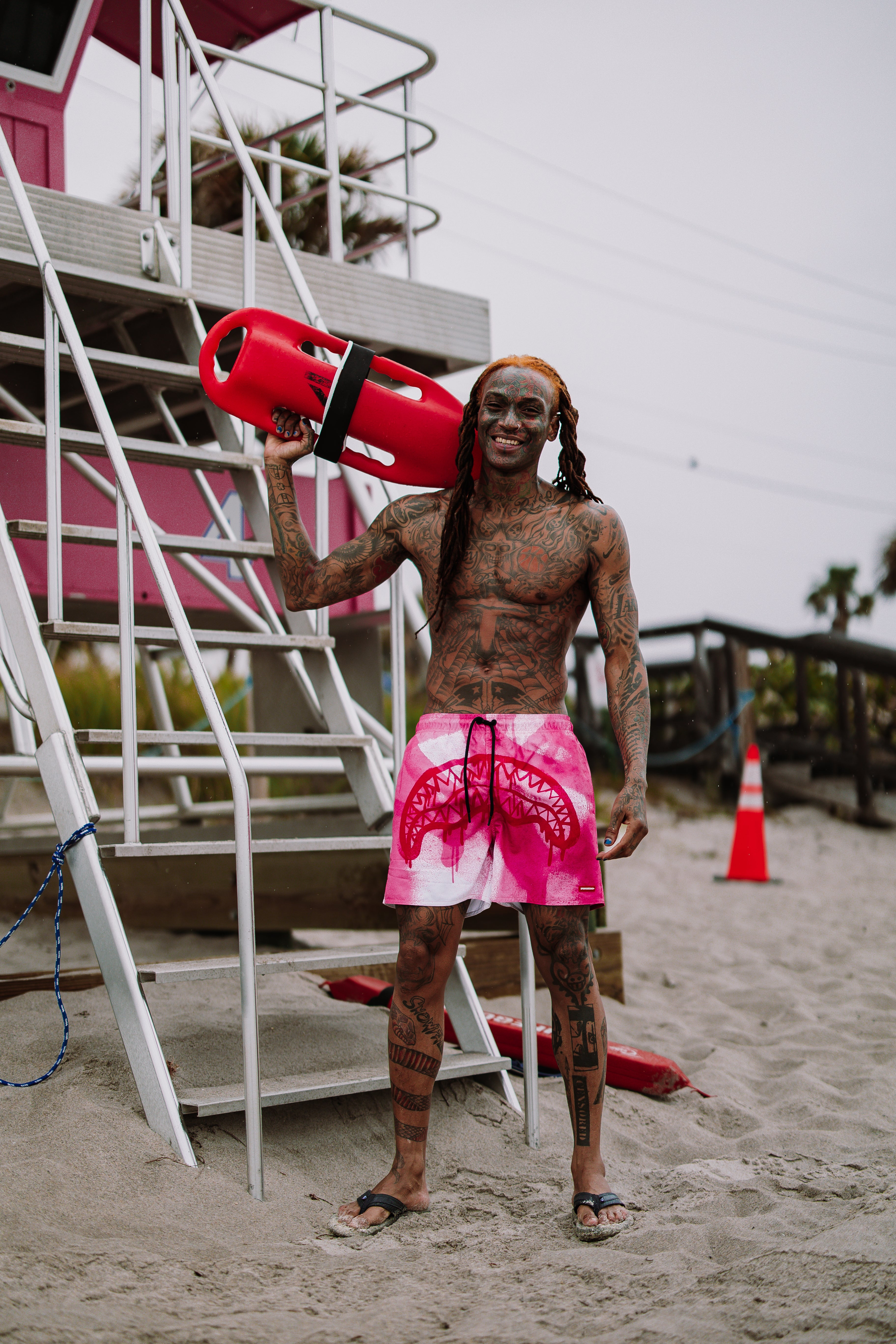 Side view of swim trunks demonstrating the 4-way stretch fabric in action.
