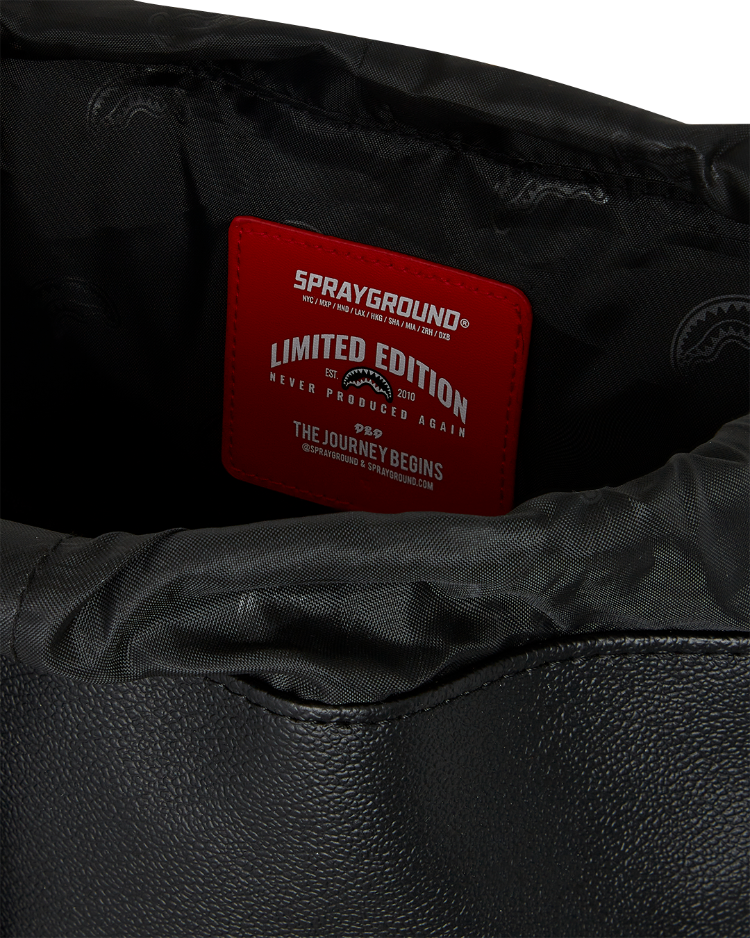 Monte Carlo backpack in royal blue, showcasing sharkmouth detailing and side pockets