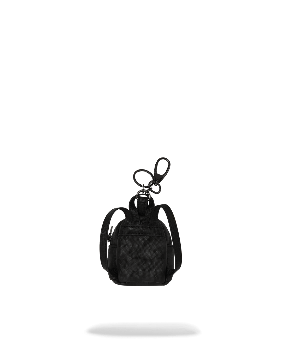 Shark keychain attached to a mini backpack strap