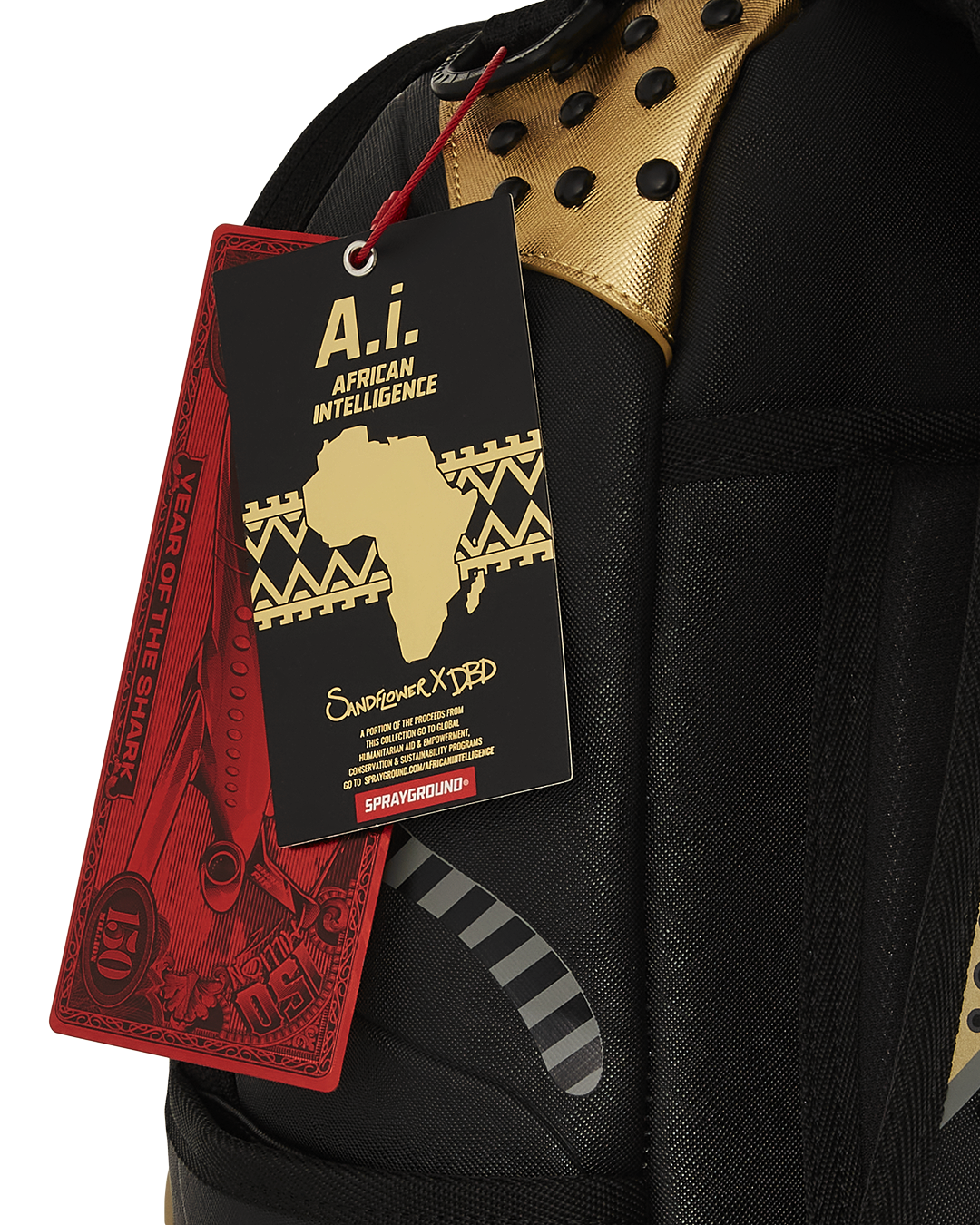 Close-up of gold zipper detailing and Sprayground badge on urban travel backpack