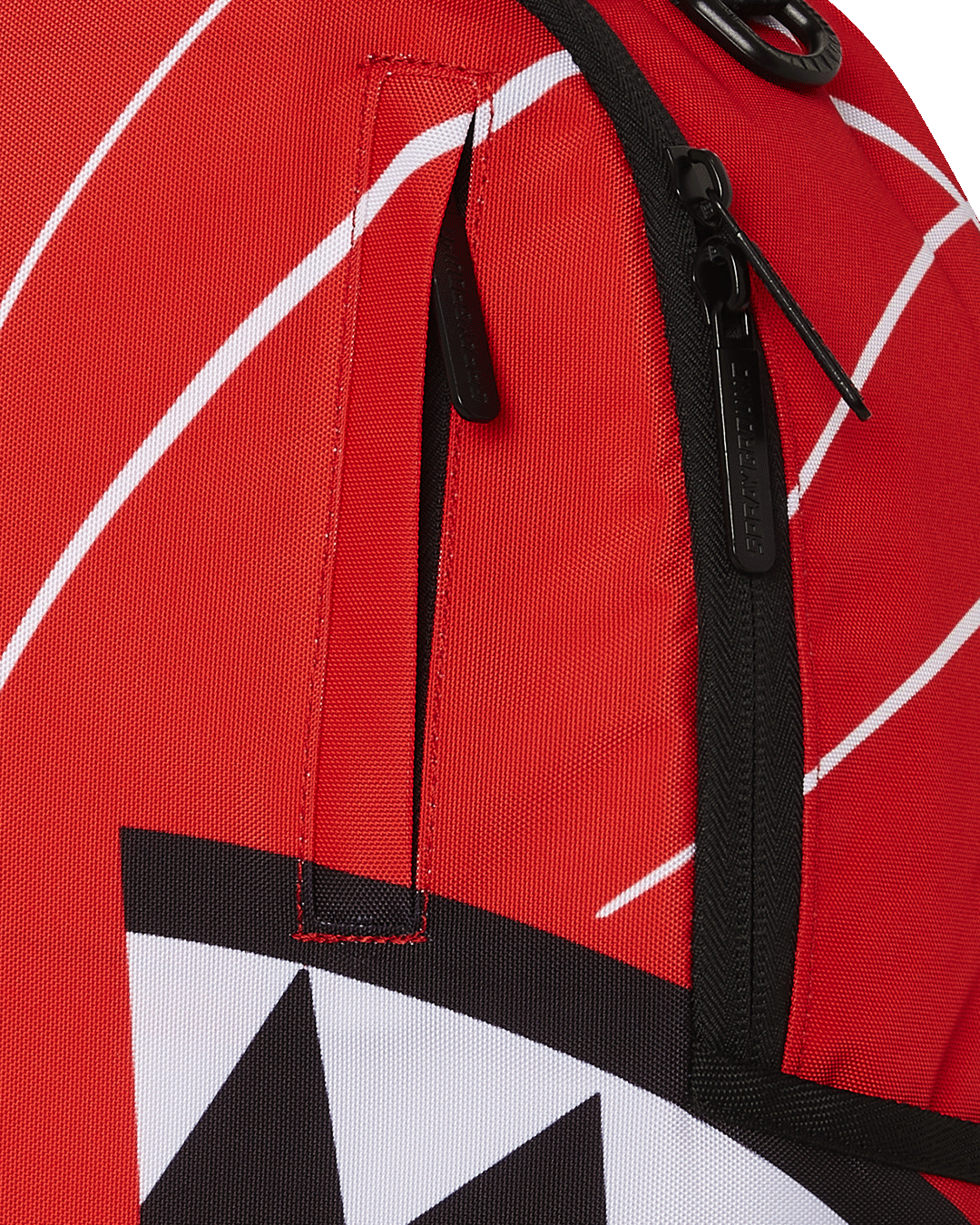 Close-up of the interior, featuring the separate velour laptop compartment and mesh organizer pocket.