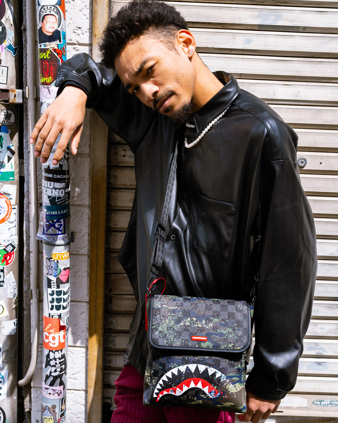 T-Rex City messenger bag for men, showing adjustable strap and zipper closure