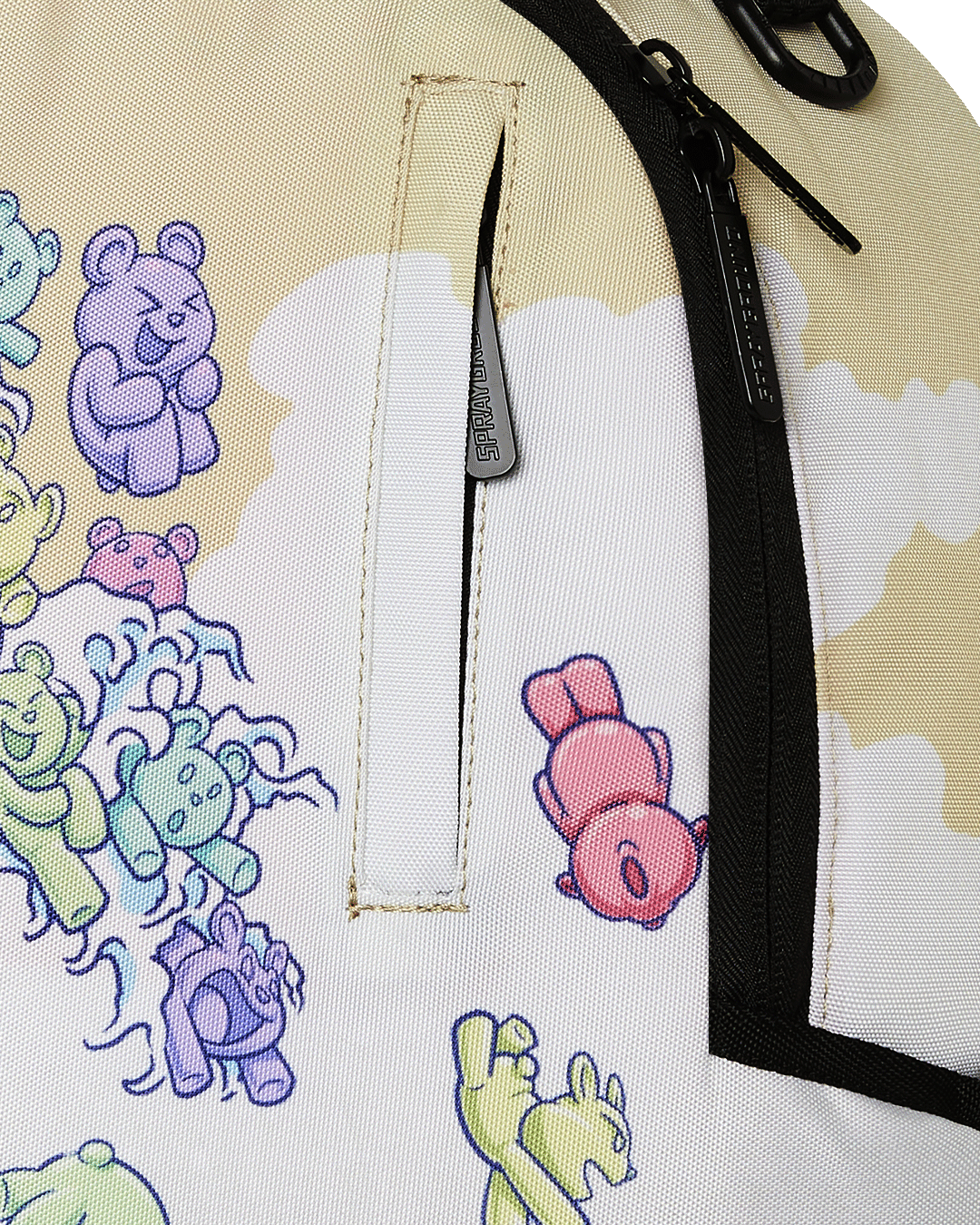 Front view of the designer backpack showing gold zippers and velour compartment