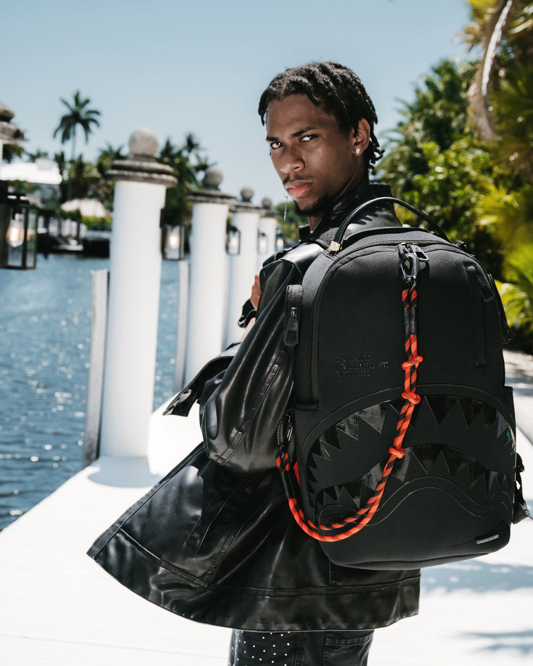 Interior shot of the backpack highlighting the velour laptop compartment and organization pockets