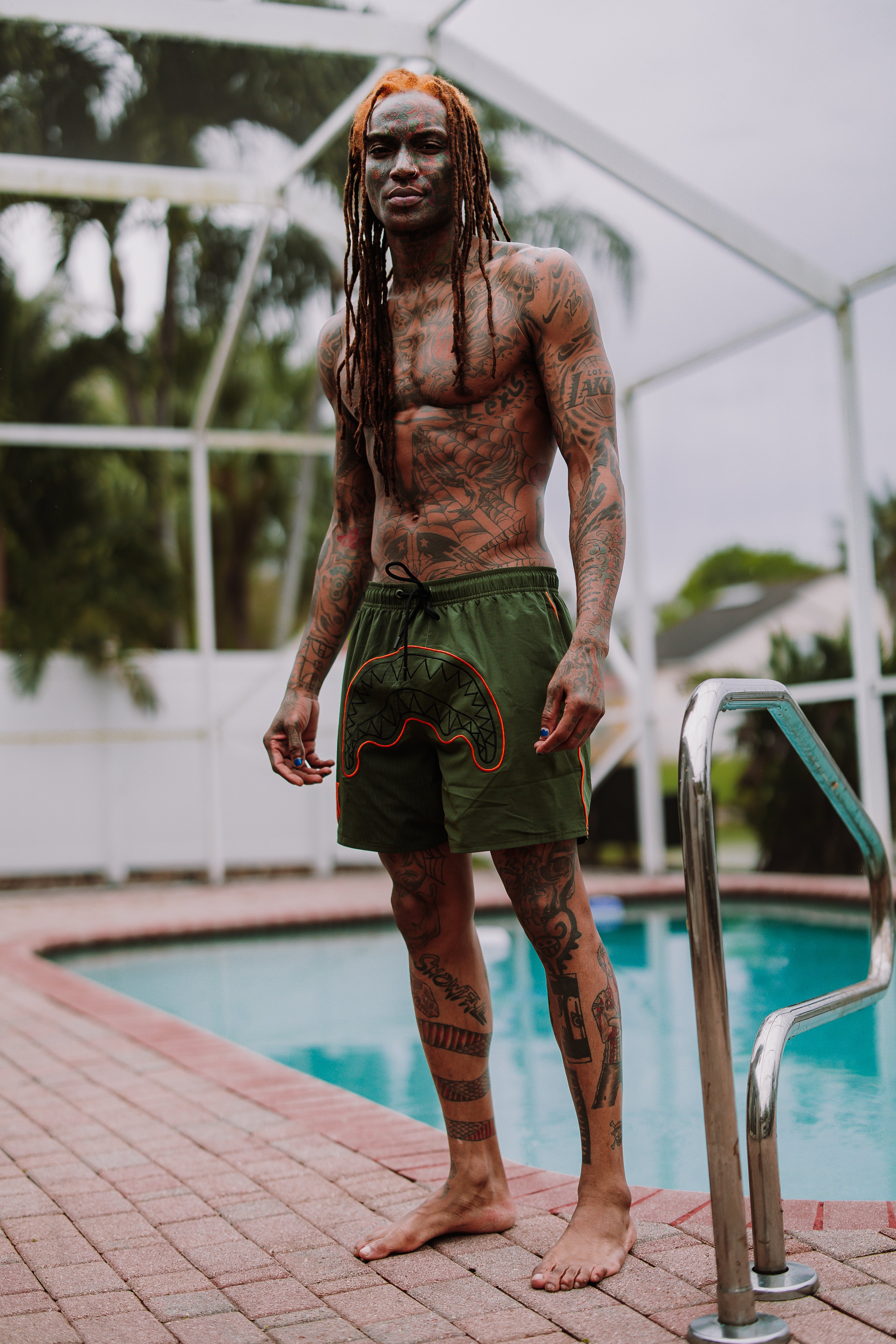 Coastal Cruiser Swim Shorts in different sizes, showcasing side pockets and back pocket with flap