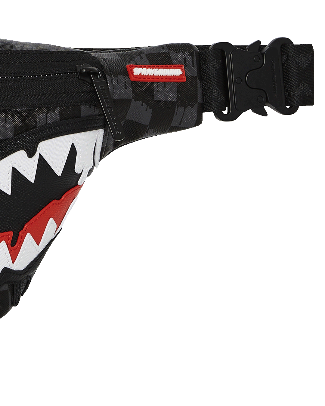 Close-up of the adjustable strap on the black crossbody bag.