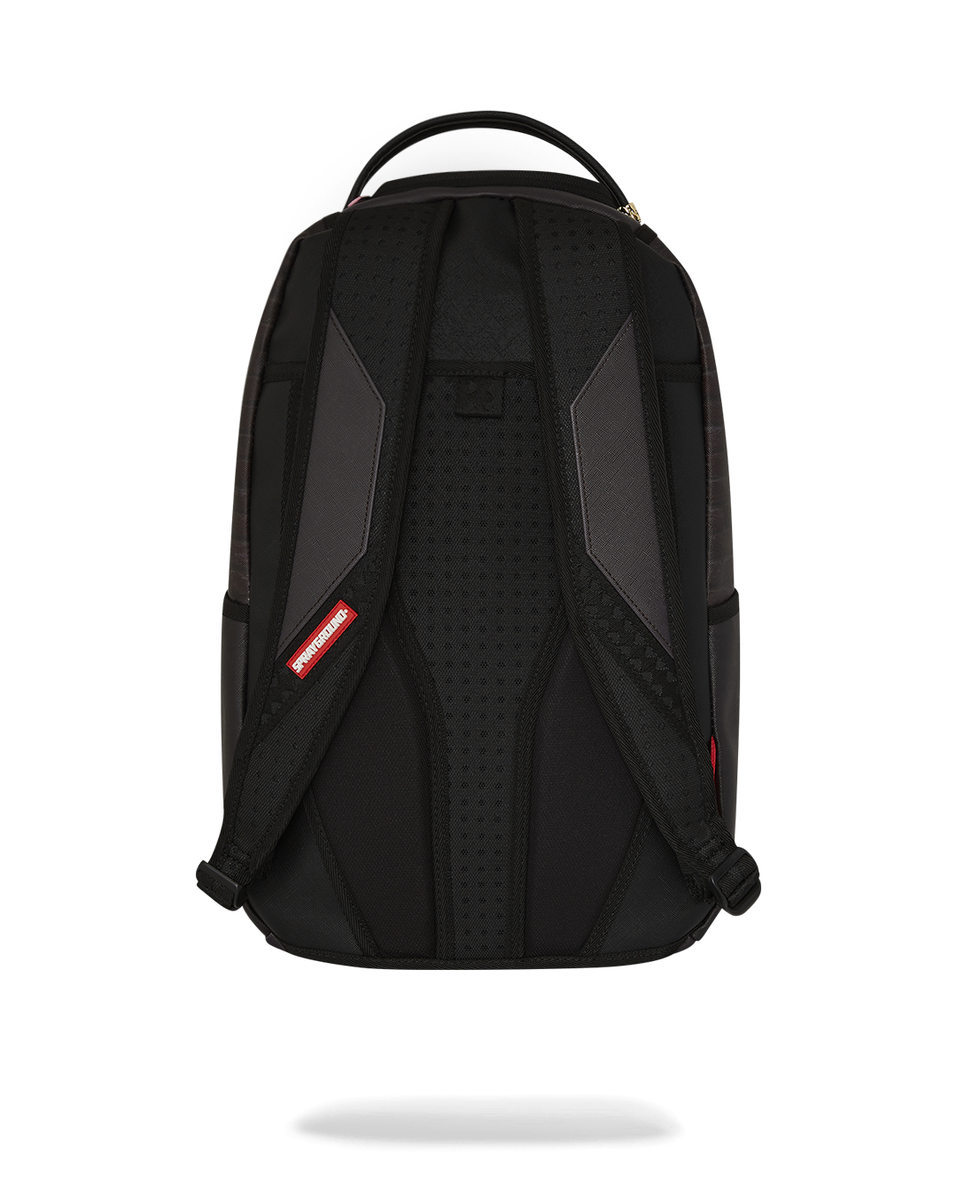 Close-up of gold zippers and metal Sprayground badge on designer backpack