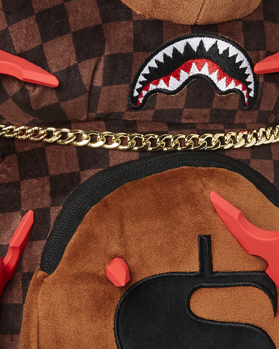 Front view of the sprayground teddy bear backpack with plush money bear design