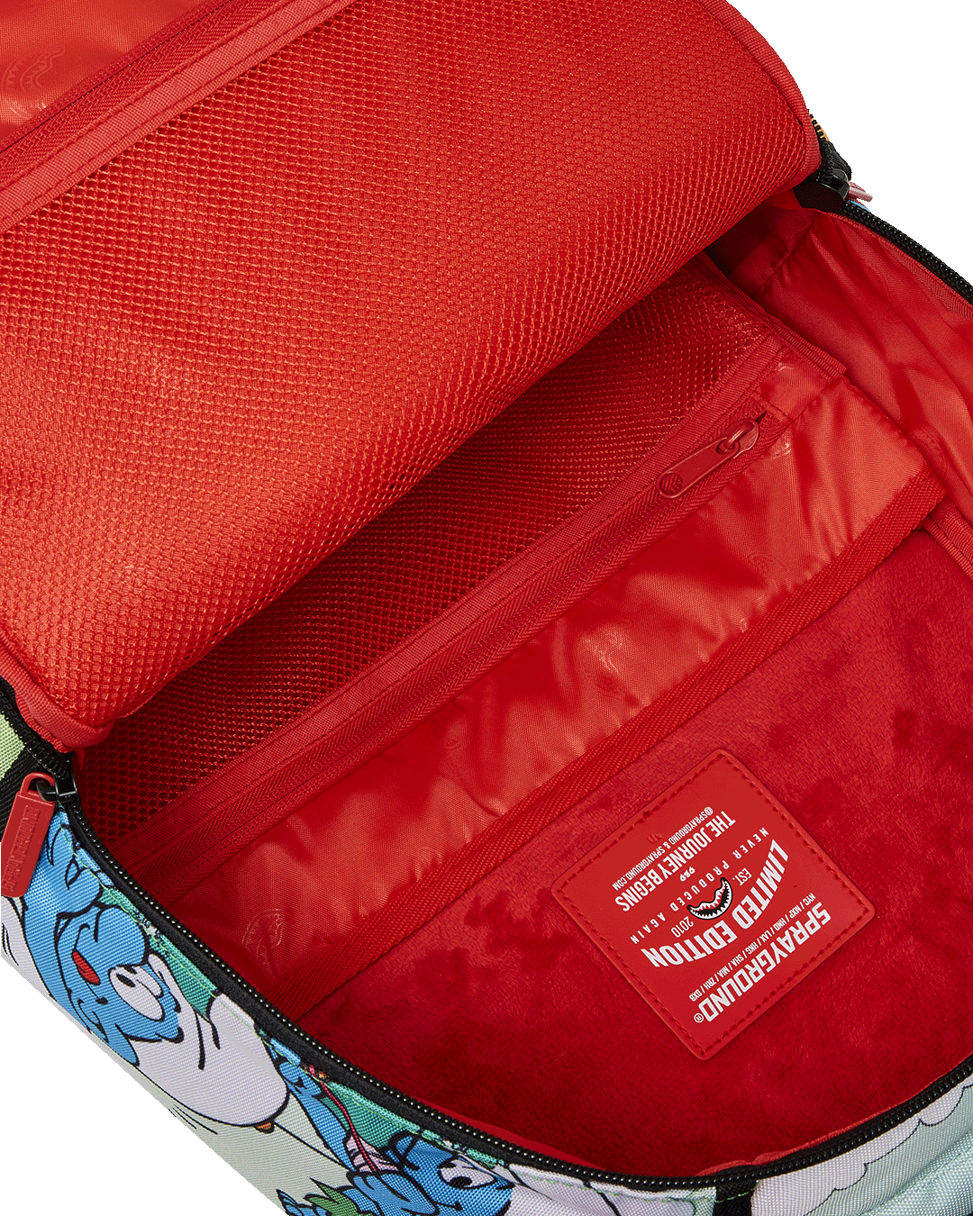 Interior view of the Smurfs backpack showing laptop compartment.