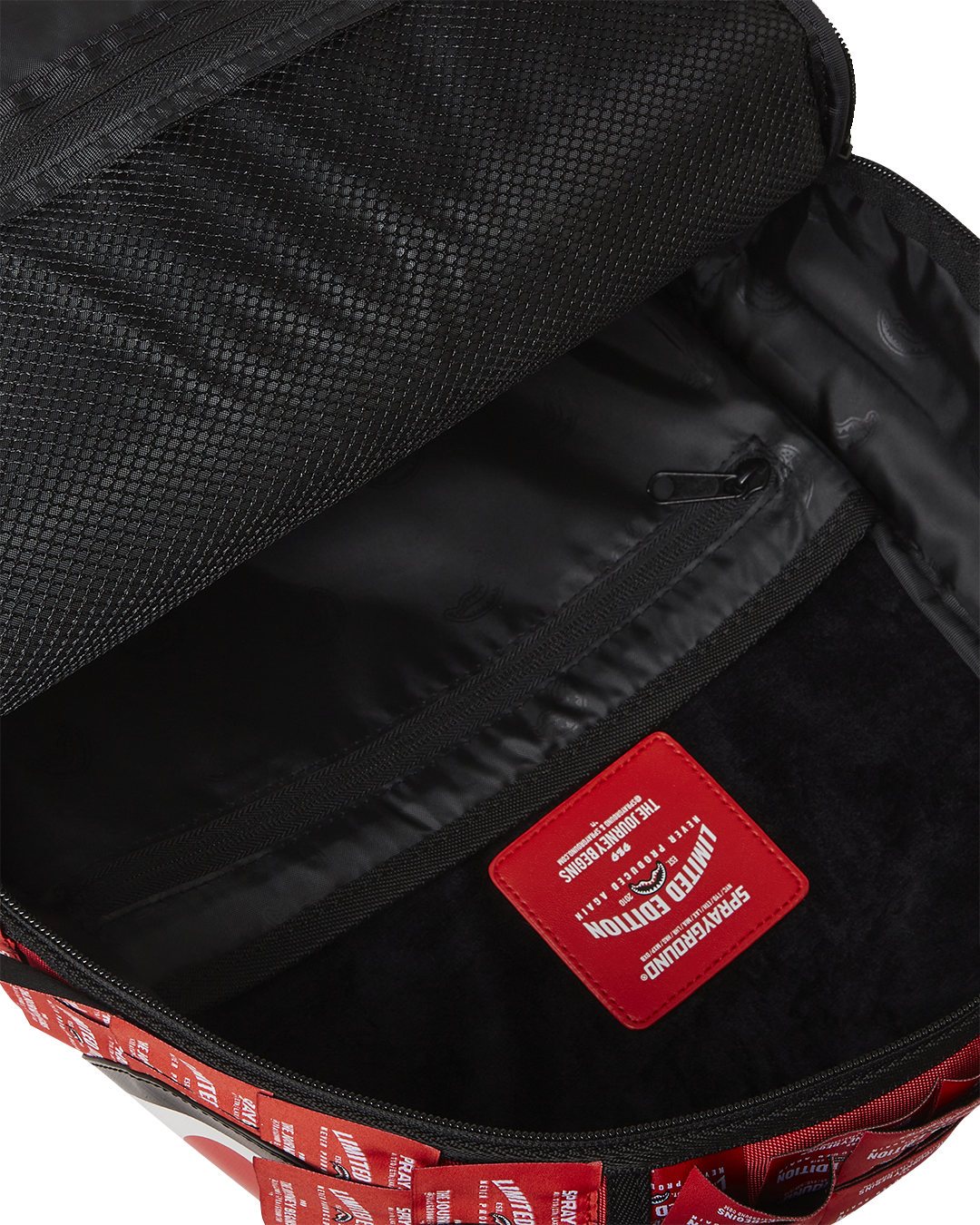Side profile showing adjustable straps and water-resistant faux leather shell.