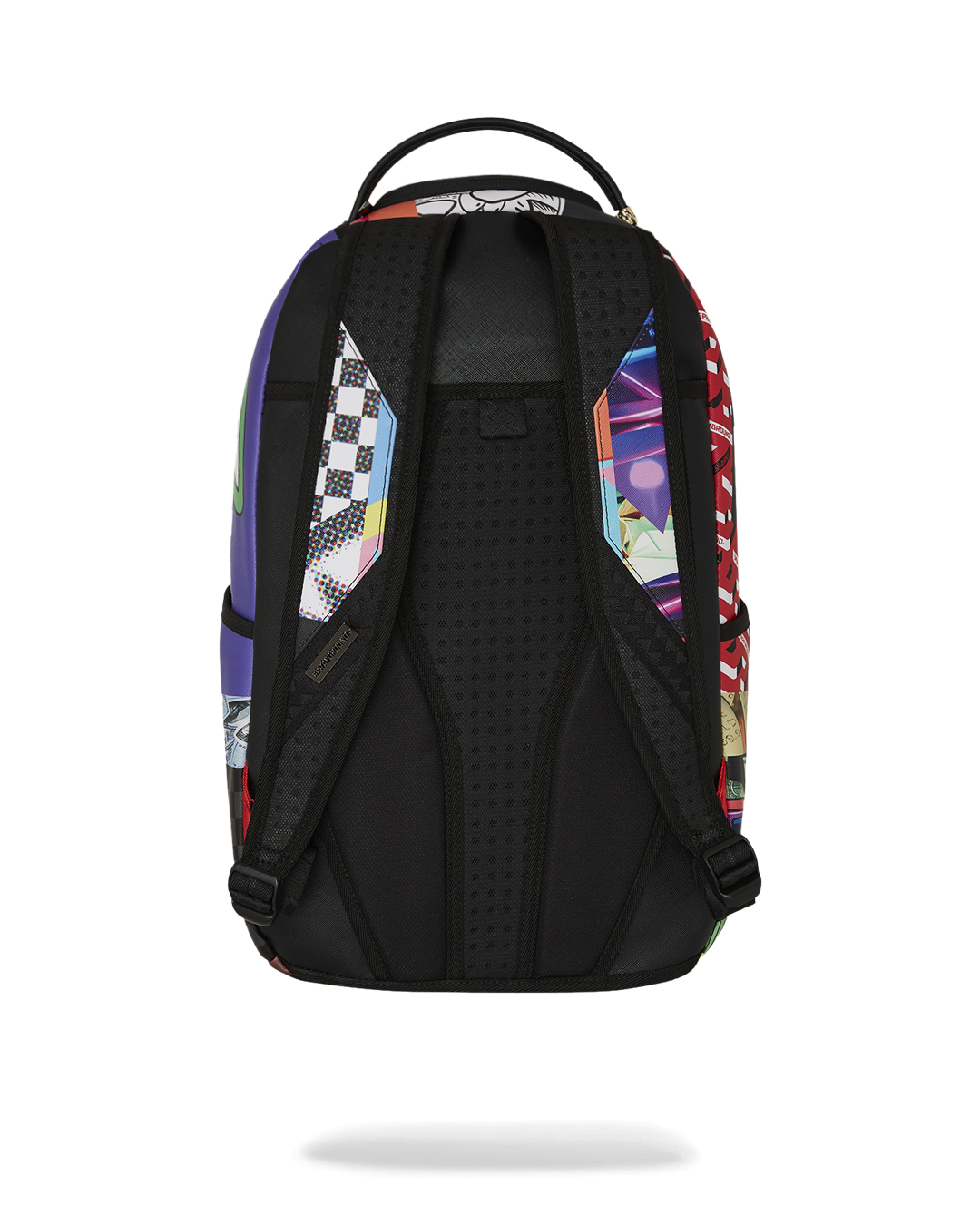 DLXV backpack mounted on luggage via slide-through back sleeve during NYC travel