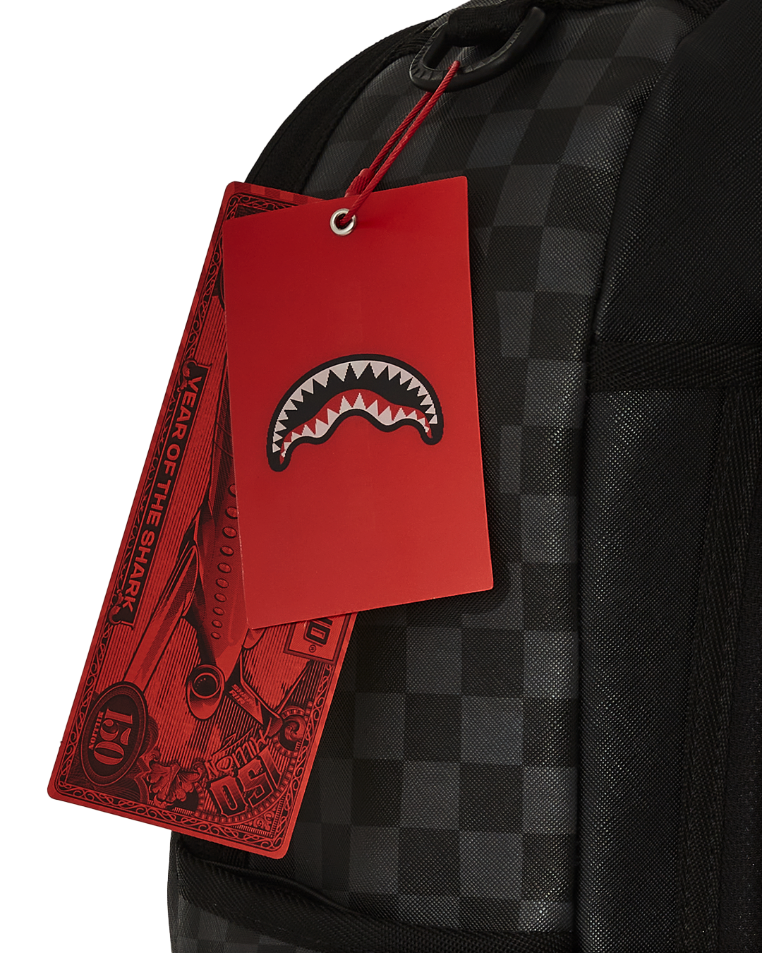 Close-up of the faux leather Snoopy mini backpack with front and side pockets.