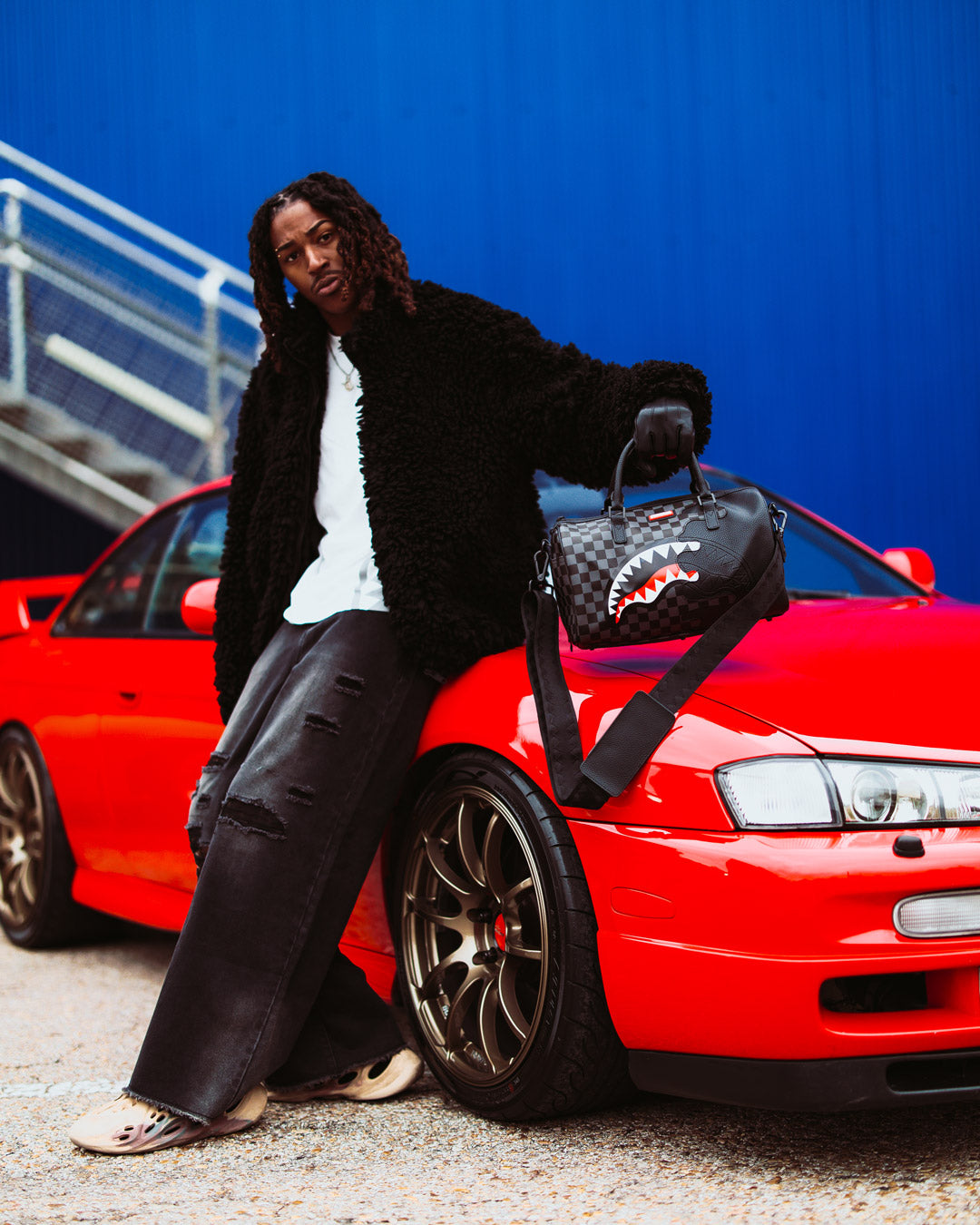 Lifestyle shot of the faux leather bag in use during a casual outing.