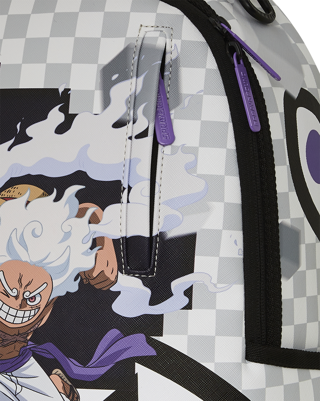 Sprayground One Piece Luffy backpacks interior, featuring a separate velour laptop compartment