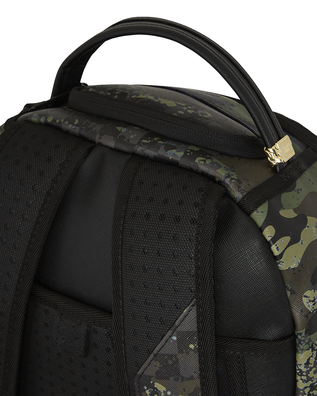 Front view of the faux leather backpack with gold hardware in an urban setting