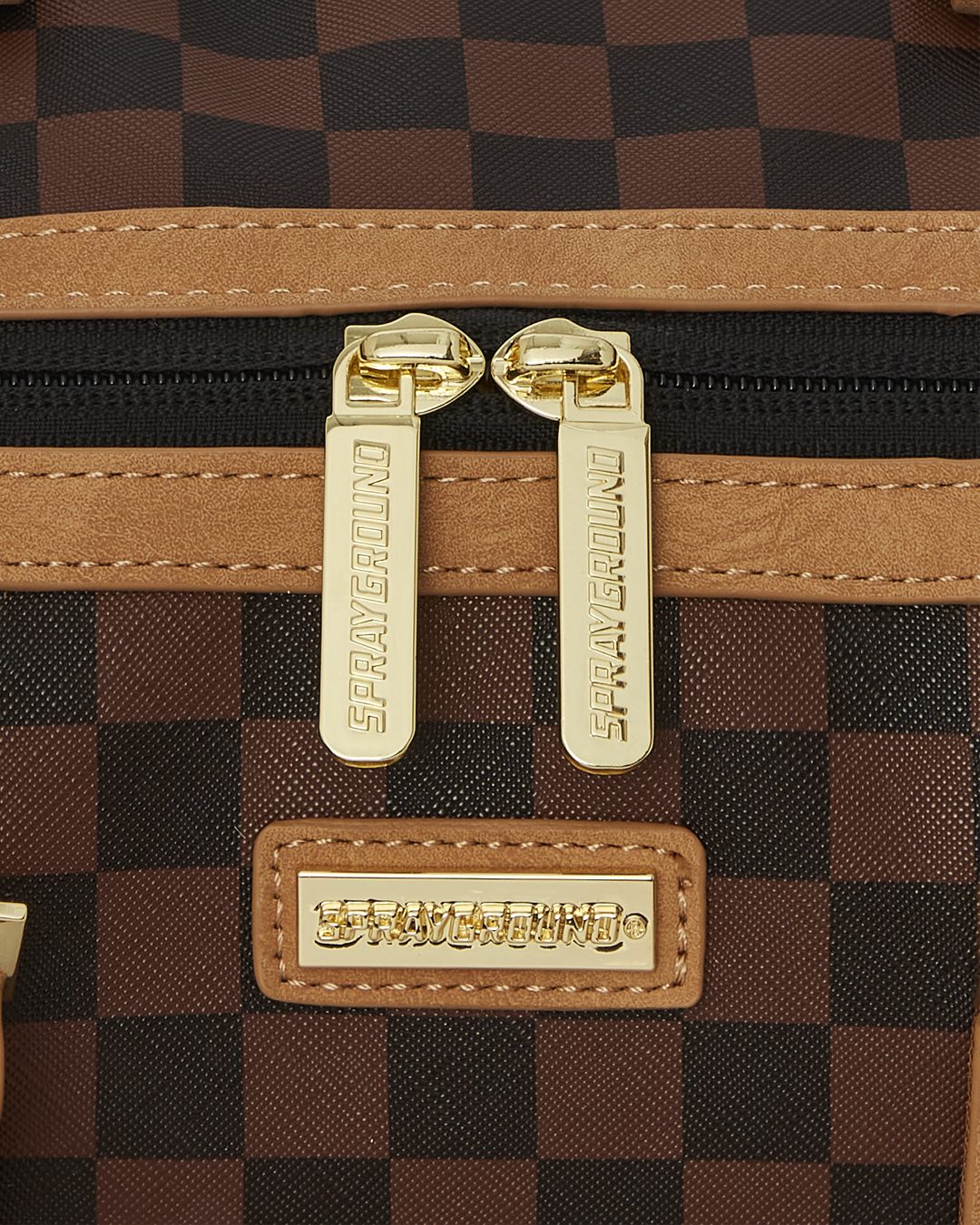 Close-up of mini duffle bag purse interior with zip pocket and structured lining