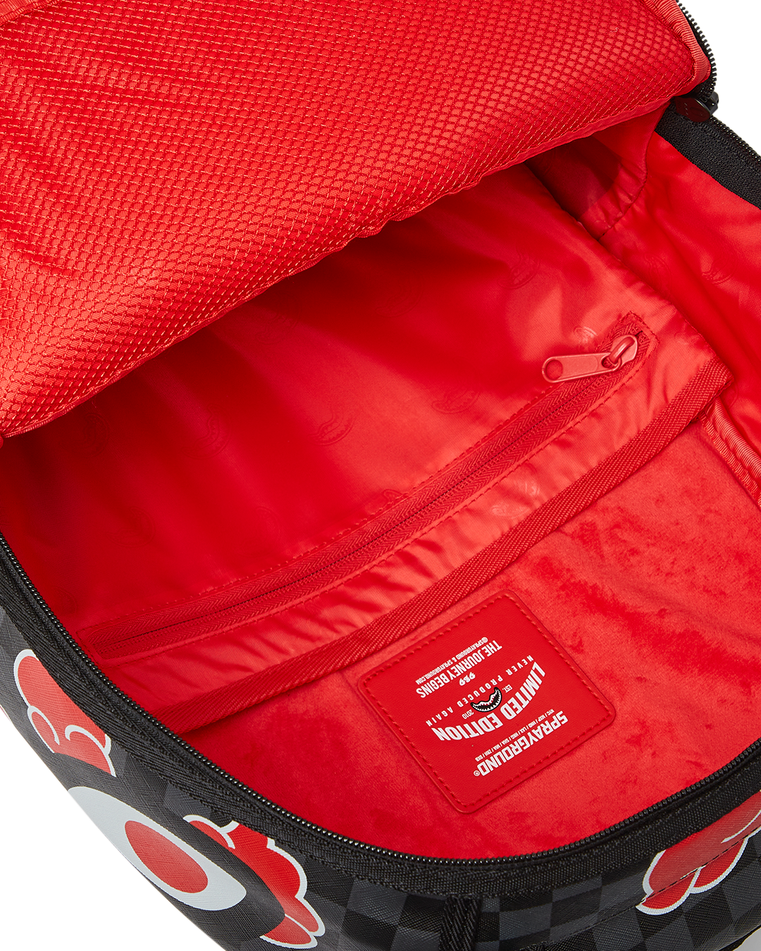 Side angle of the plush animal backpack showing adjustable straps