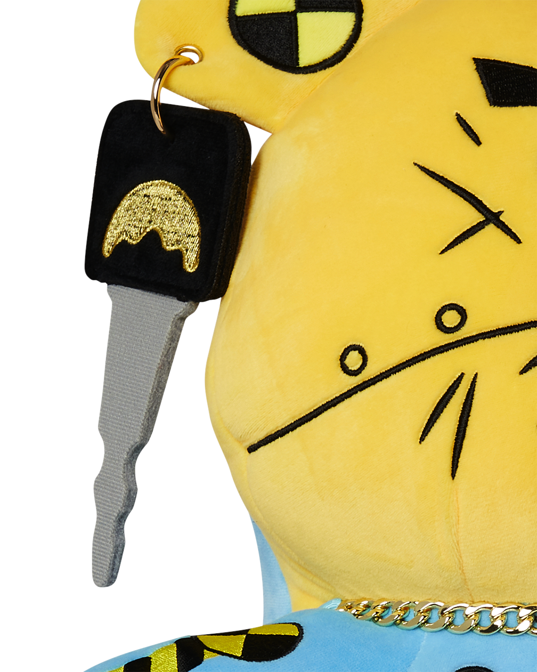 Side view showing the adjustable straps of the teddy bear backpack.