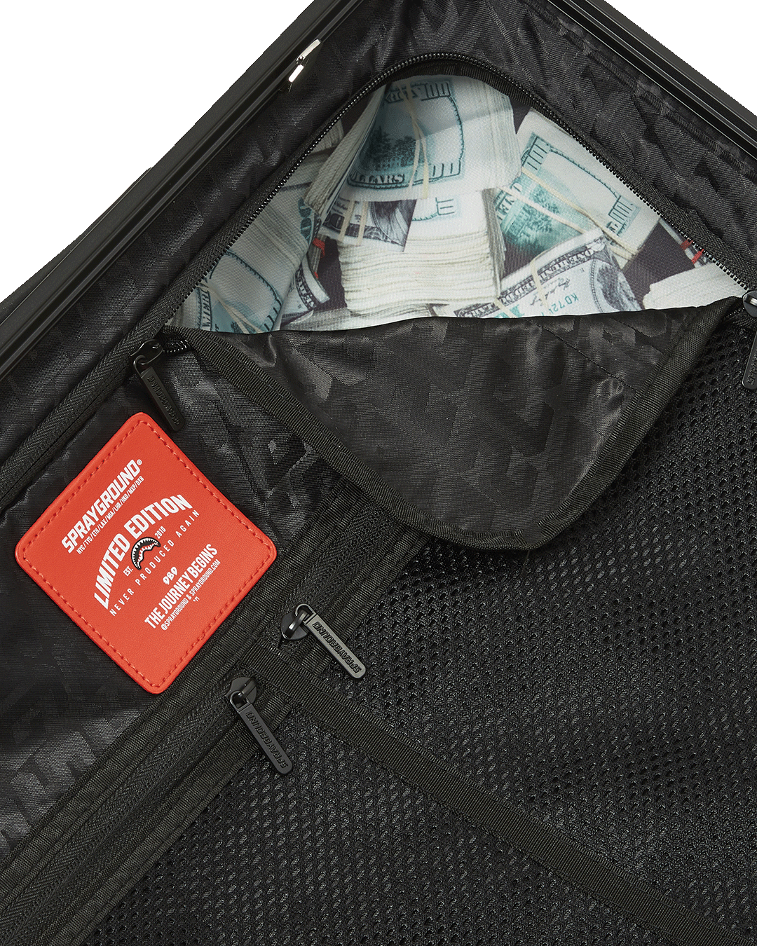 Interior of SpeedShark hardshell carry-on luggage showing multiple pockets and compression straps