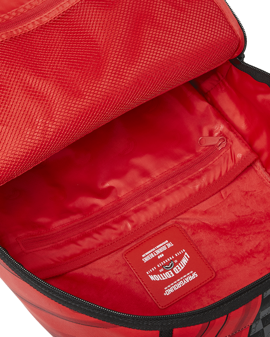 Close-up of the ergonomic mesh back padding on the faux leather backpack.