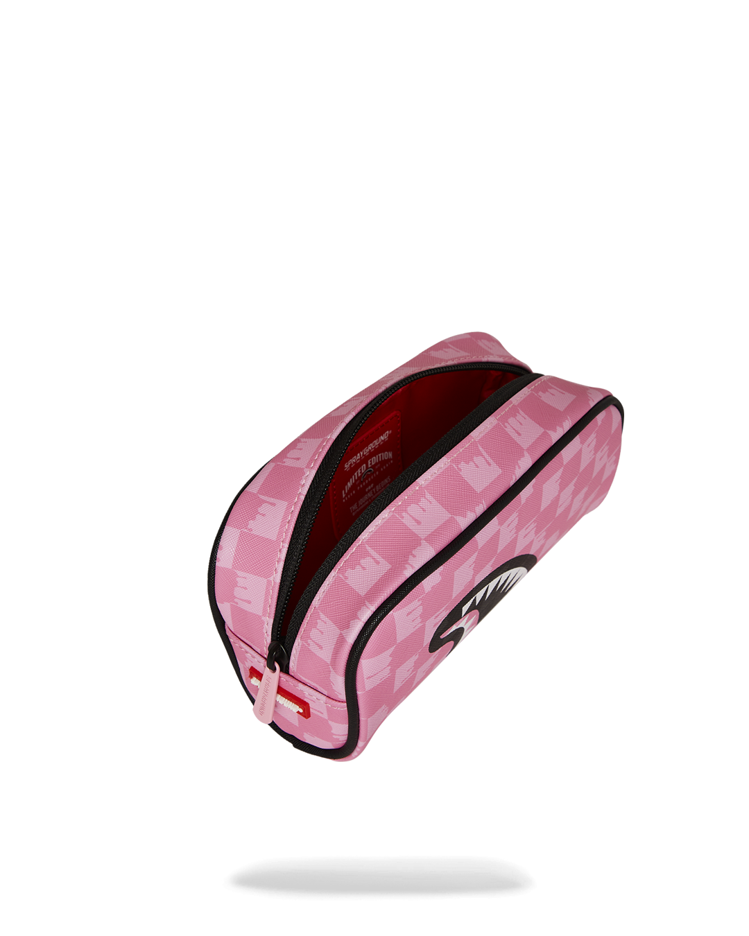 Clear zipper pouch styled with cosmetics and travel items