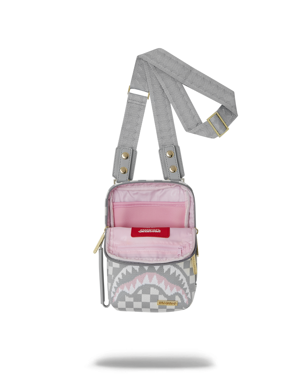 The bags interior, showing the zippered organizer pocket and slip pocket.