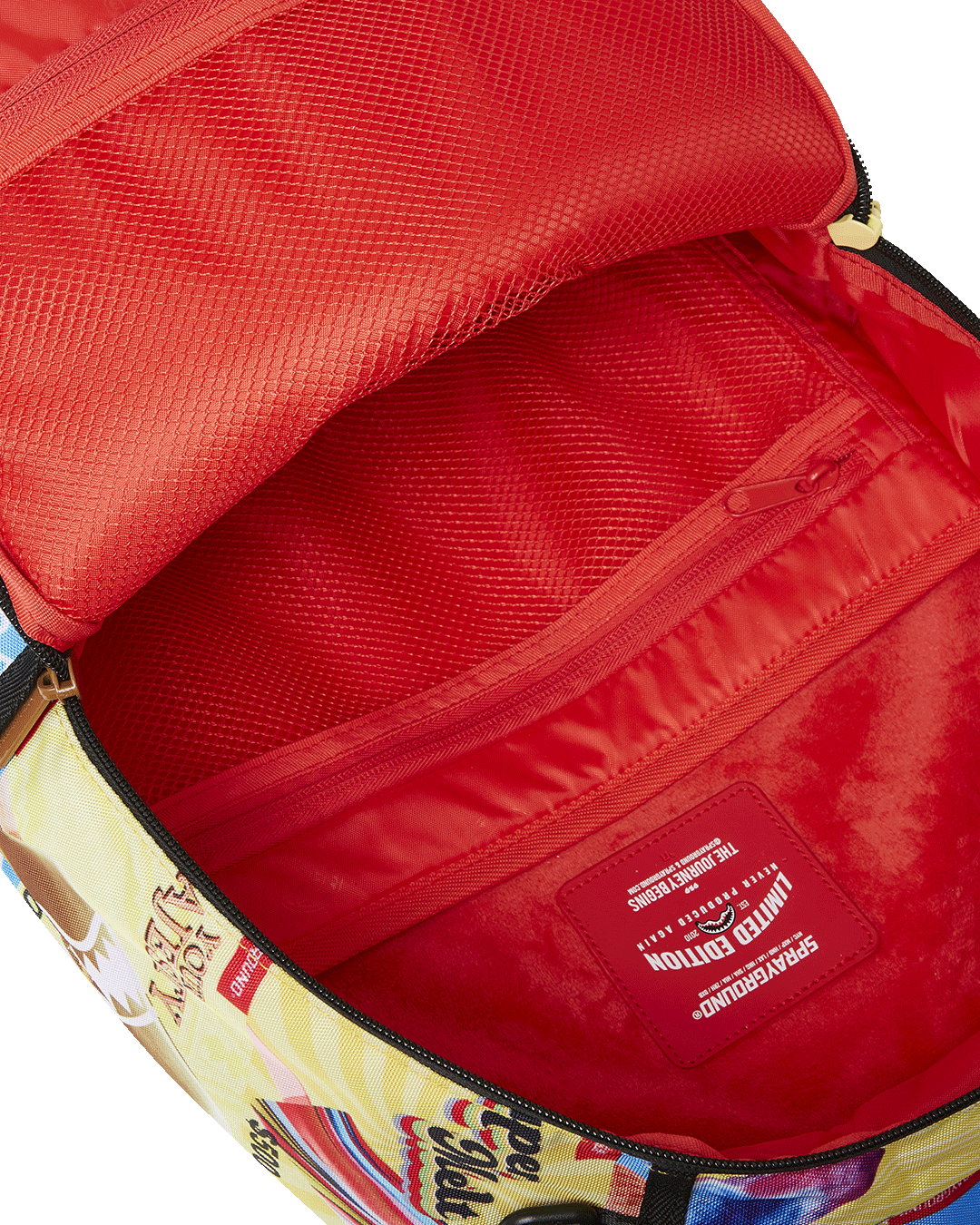 Side view of clear Sprayground backpack, showing gold zippers and mesh back padding