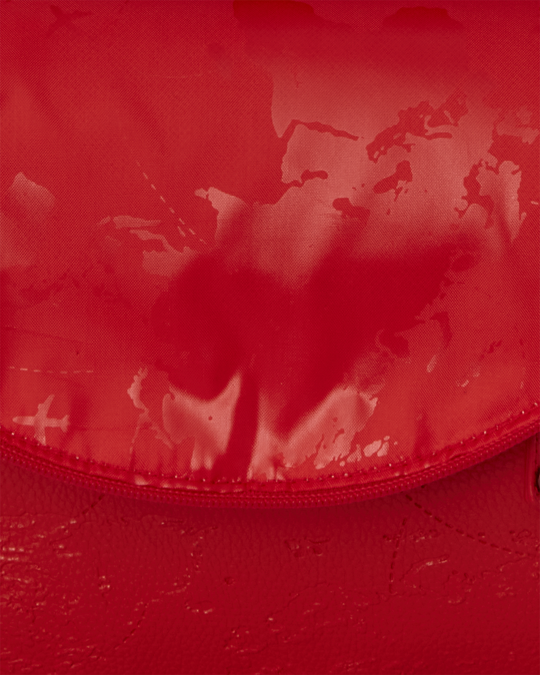 Back view showing ergonomic mesh padding on the ruby red Chateau backpack
