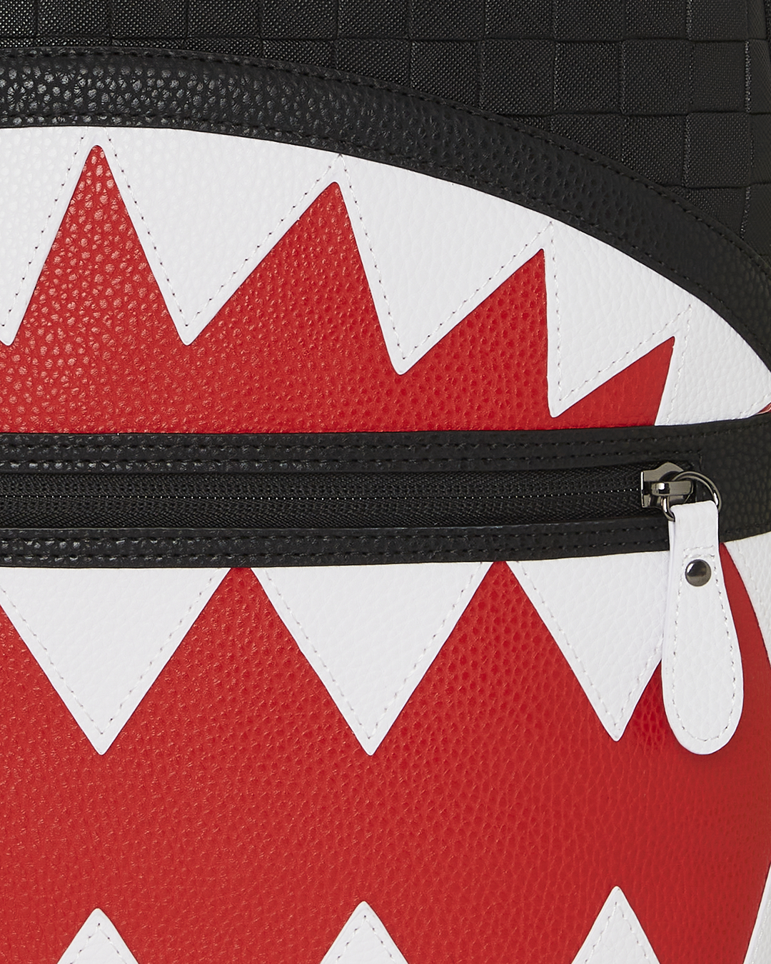 Faux leather backpack with embossed check pattern and gold zippers for travel and daily use