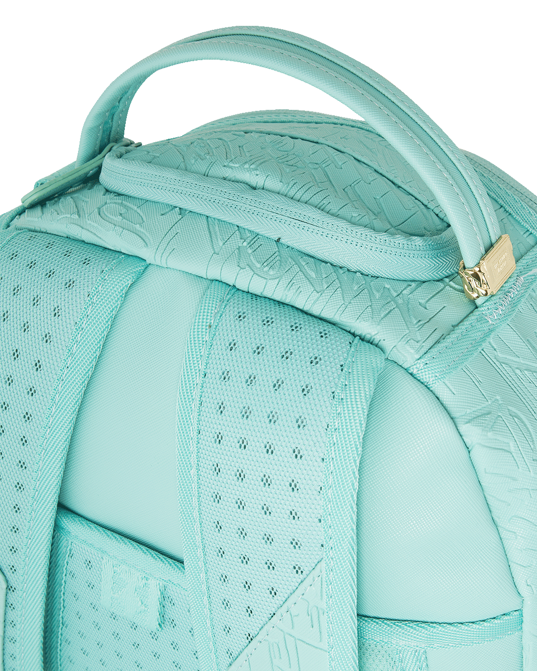 Front view of stylish backpack with graffiti embossing and gold zippers