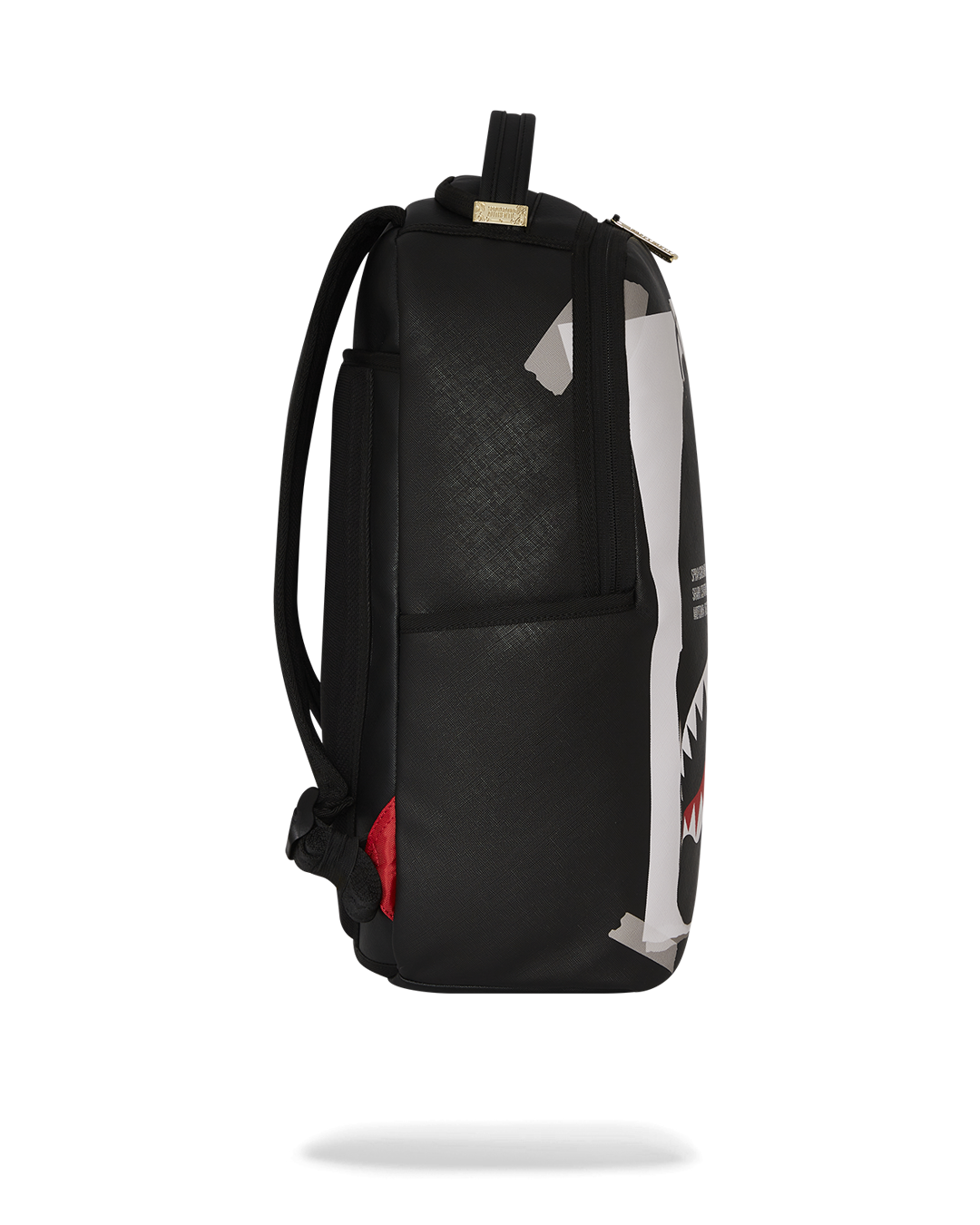 Side view showing side pockets and gold zippers on faux leather backpack.