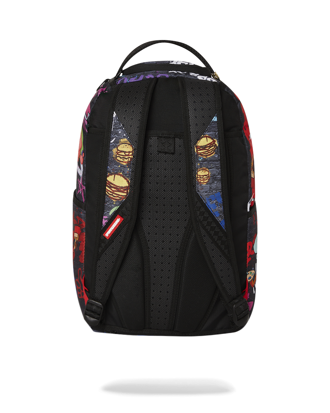 Front view of the Limited Edition pink Sprayground backpack showcasing its vibrant design and gold zippers.