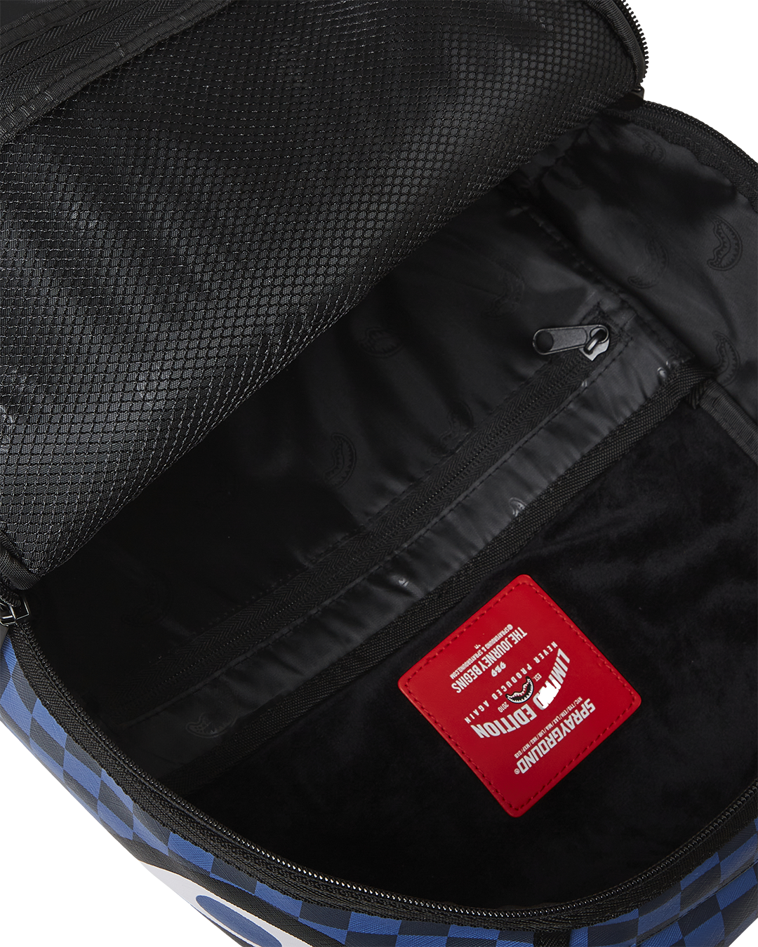 Front view of the Midnight Magic Shark backpack with multiple compartments and adjustable straps