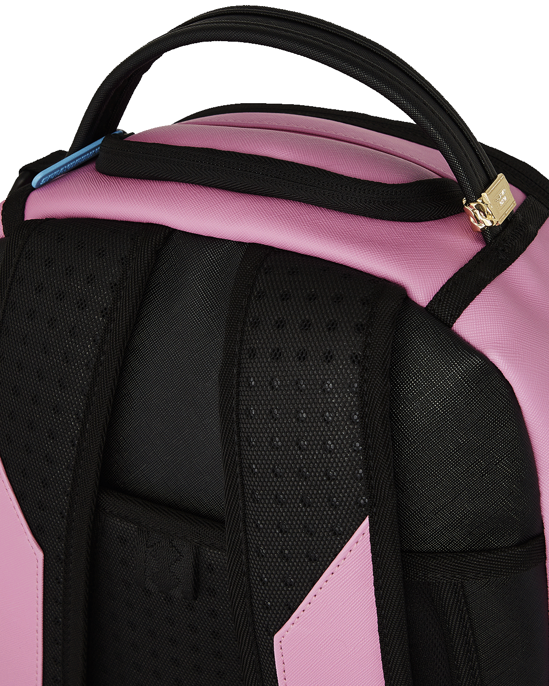 Backpack attached to luggage via slide-through sleeve for travel convenience