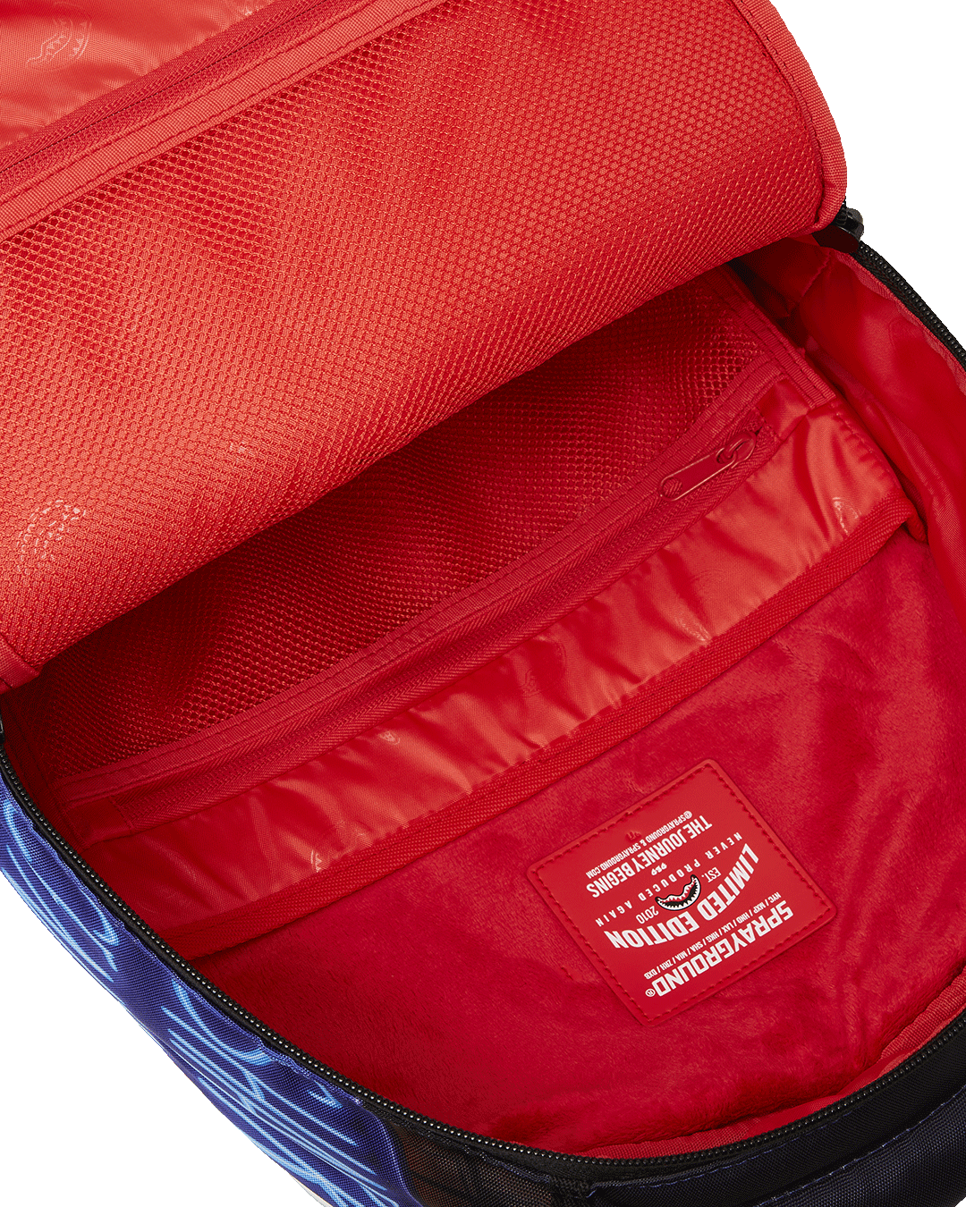 Close-up of the velour laptop compartment and keychain puller.