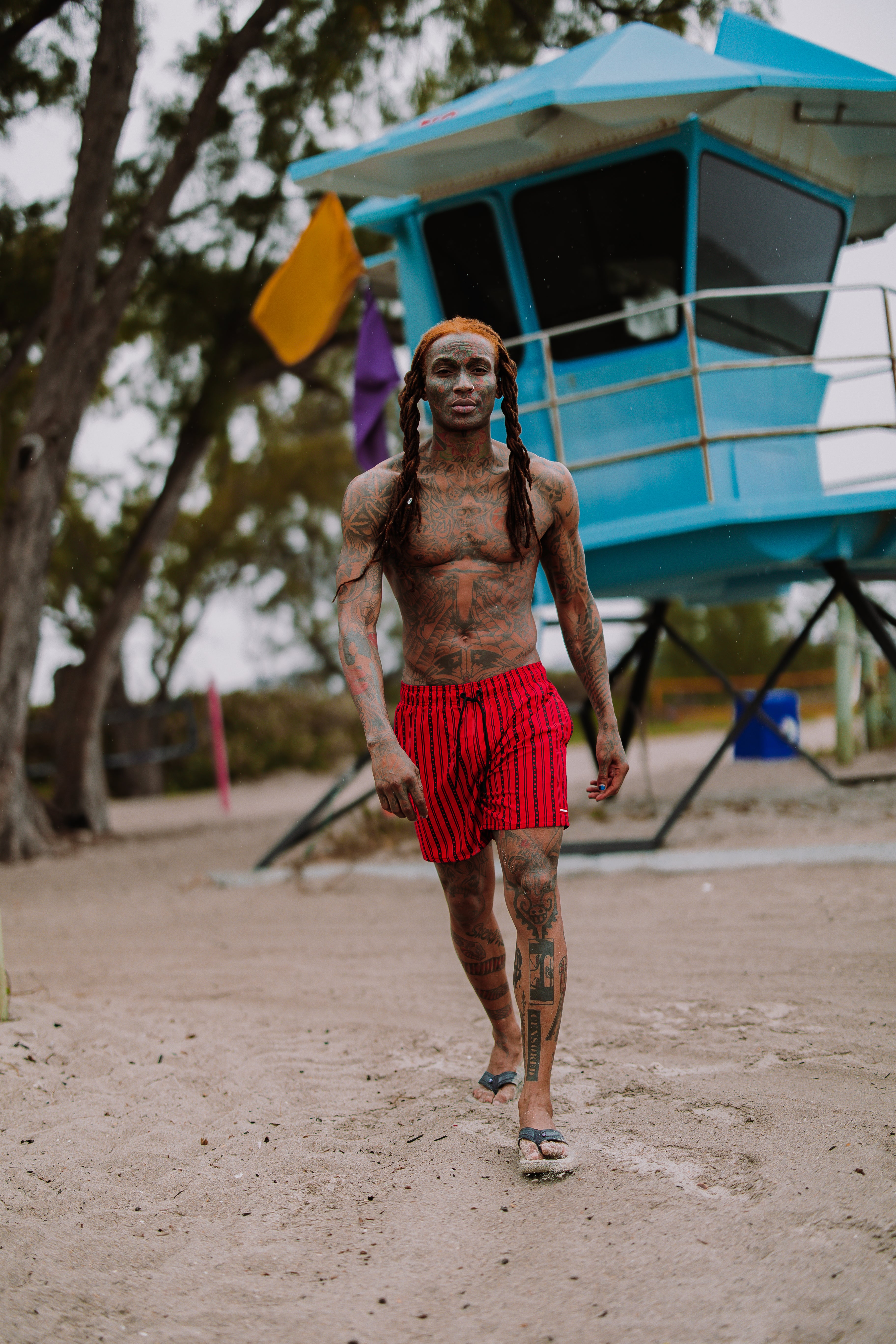 Side view of mens swim shorts showing pocket and leg cut